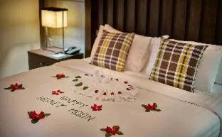 Bed in Khanom Beach Resort And Spa