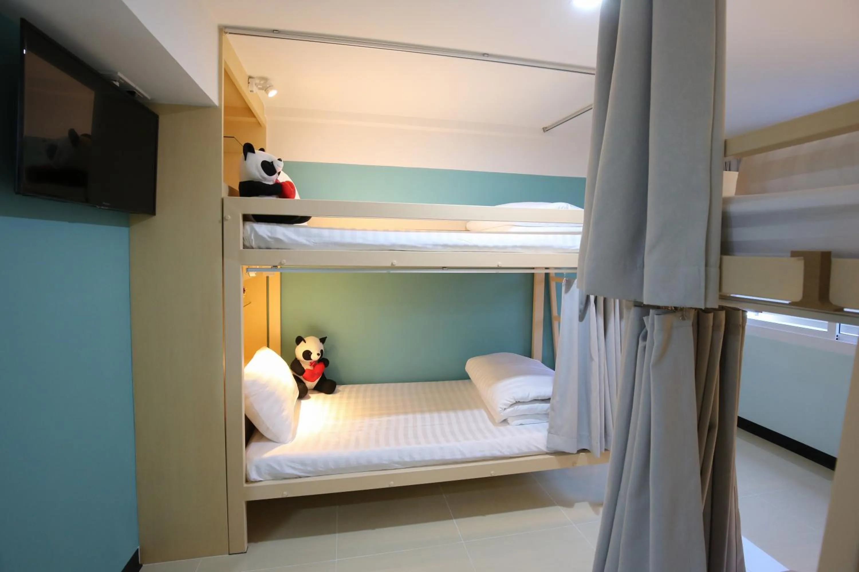Bed in Lucky panda Hotel