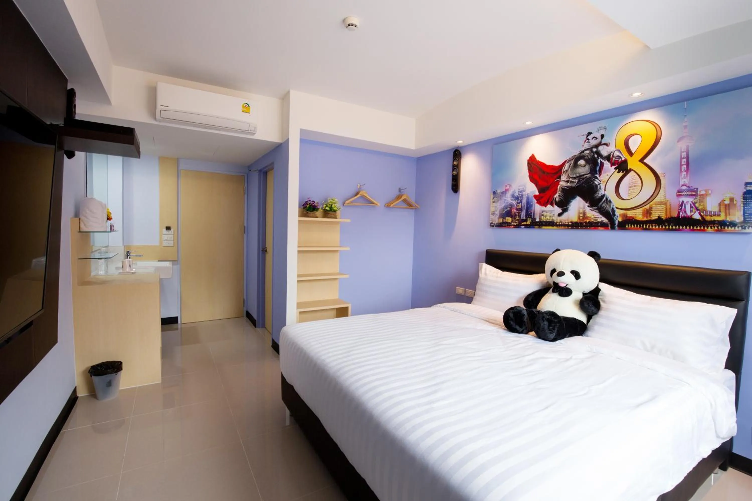 Bed in Lucky panda Hotel