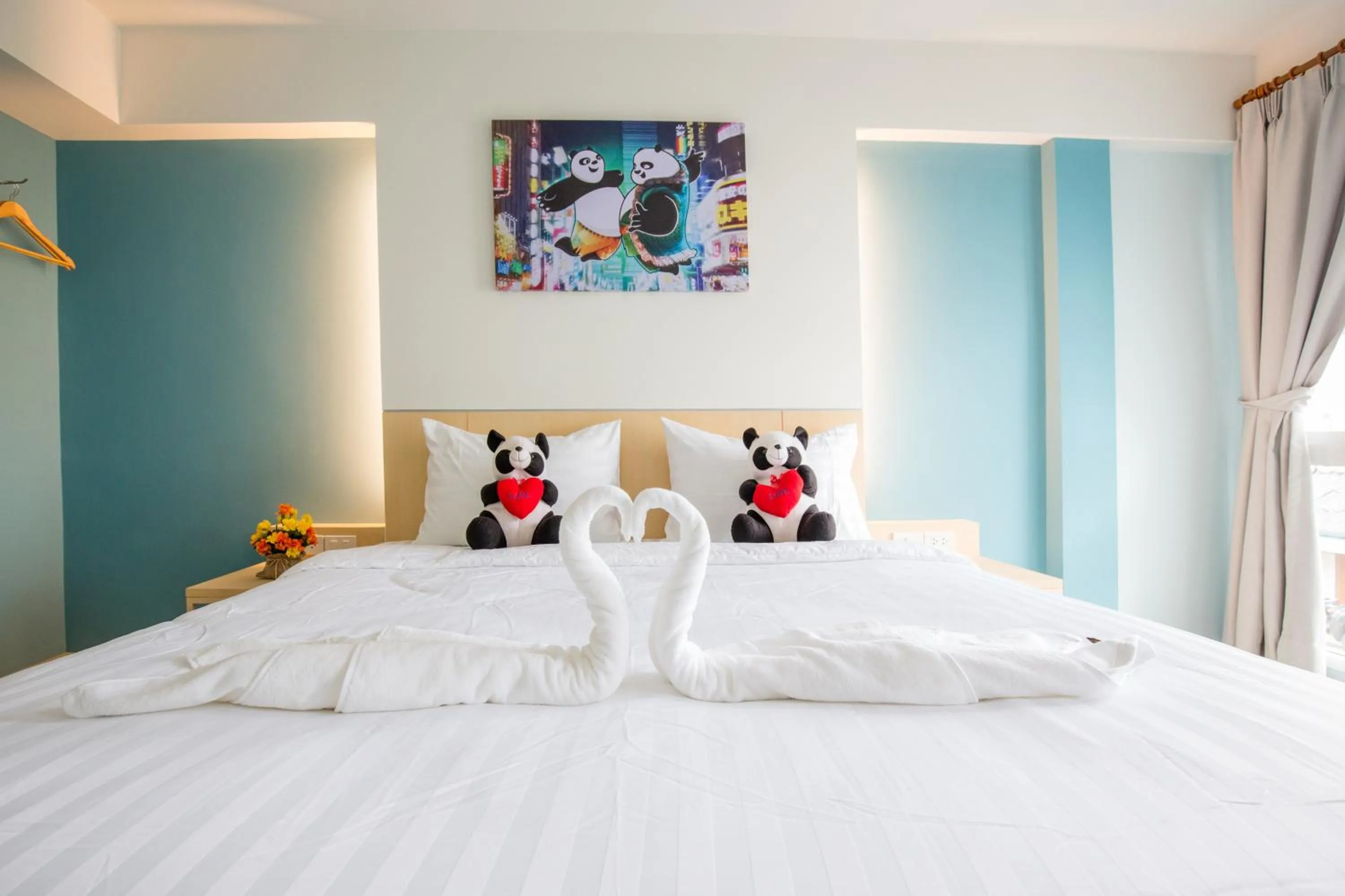 Bed in Lucky panda Hotel