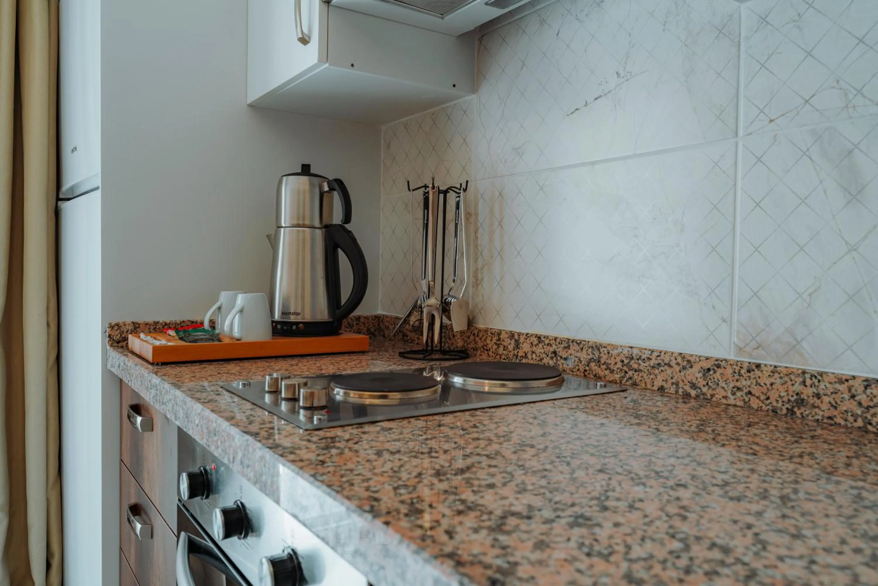 Kitchen or kitchenette in Empula Hotel & Residences