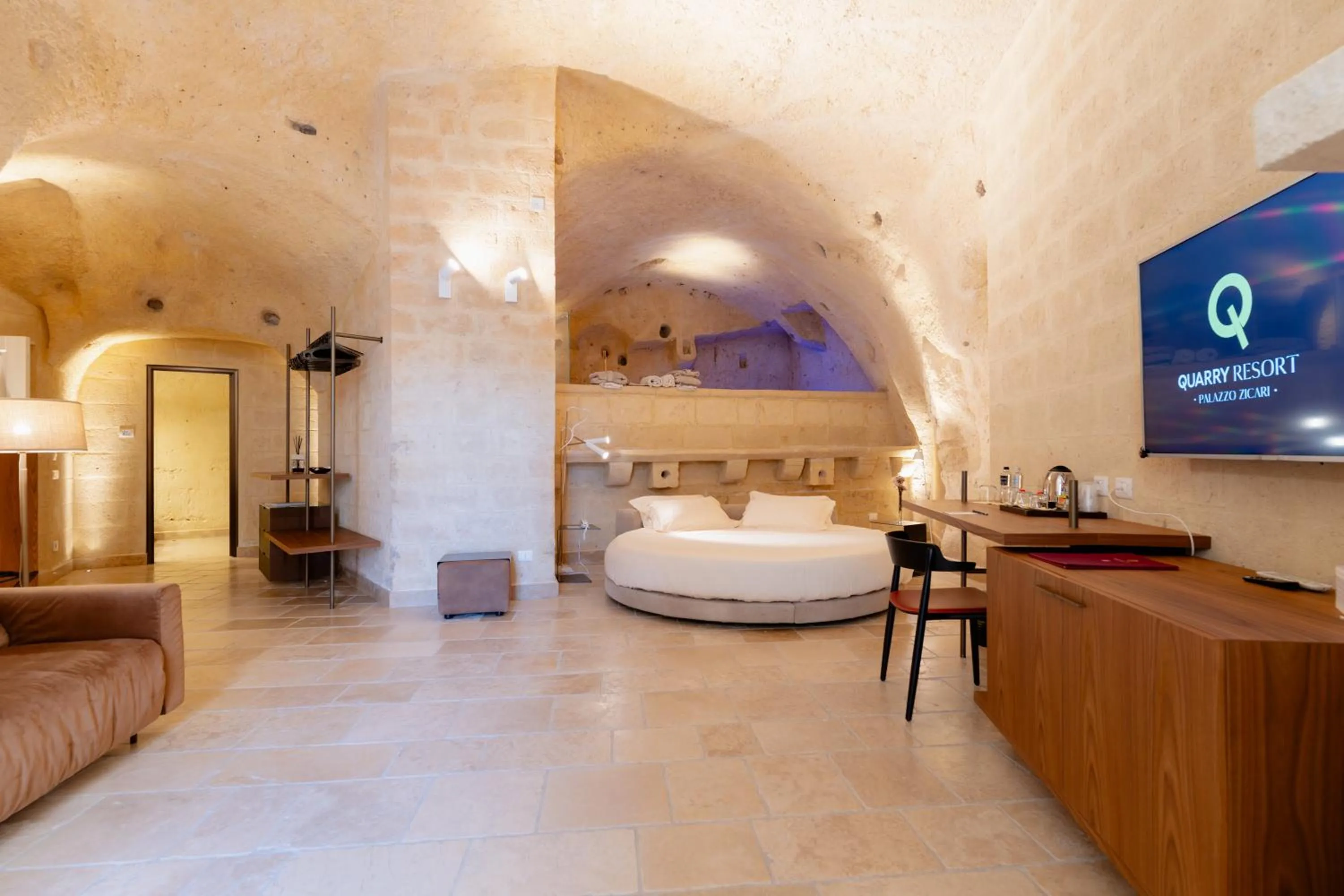 Photo of the whole room, Bed in BV Quarry Matera