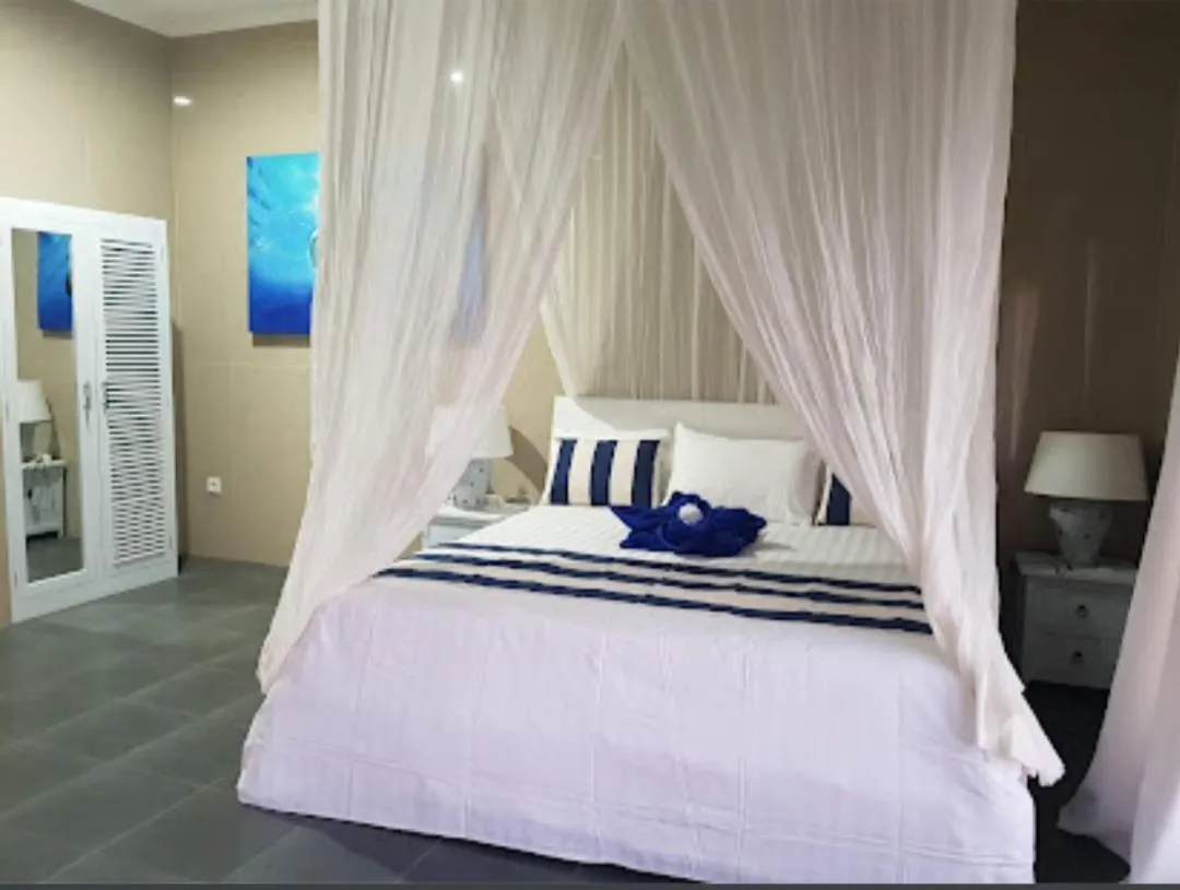 Bedroom in Bayu Cottages