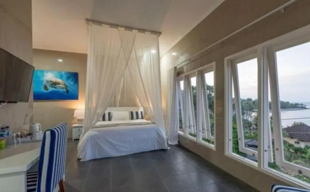 Bed in Bayu Cottages