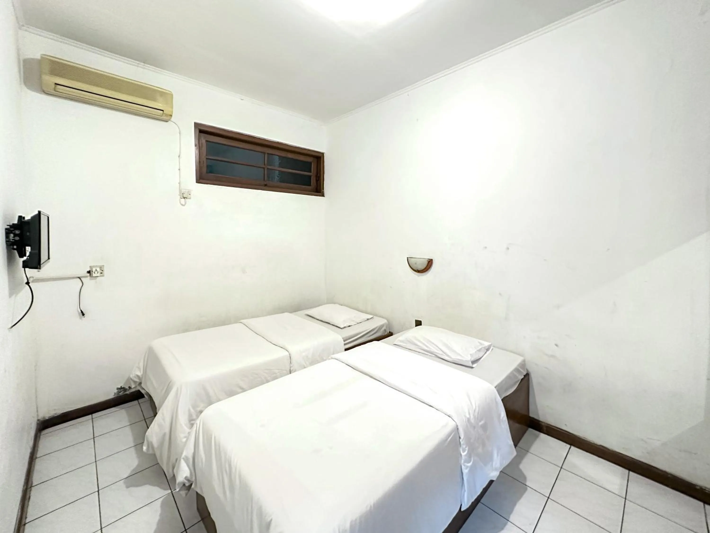 Bedroom, Bed in Hotel Dewi Sri Prawirotaman RedPartner