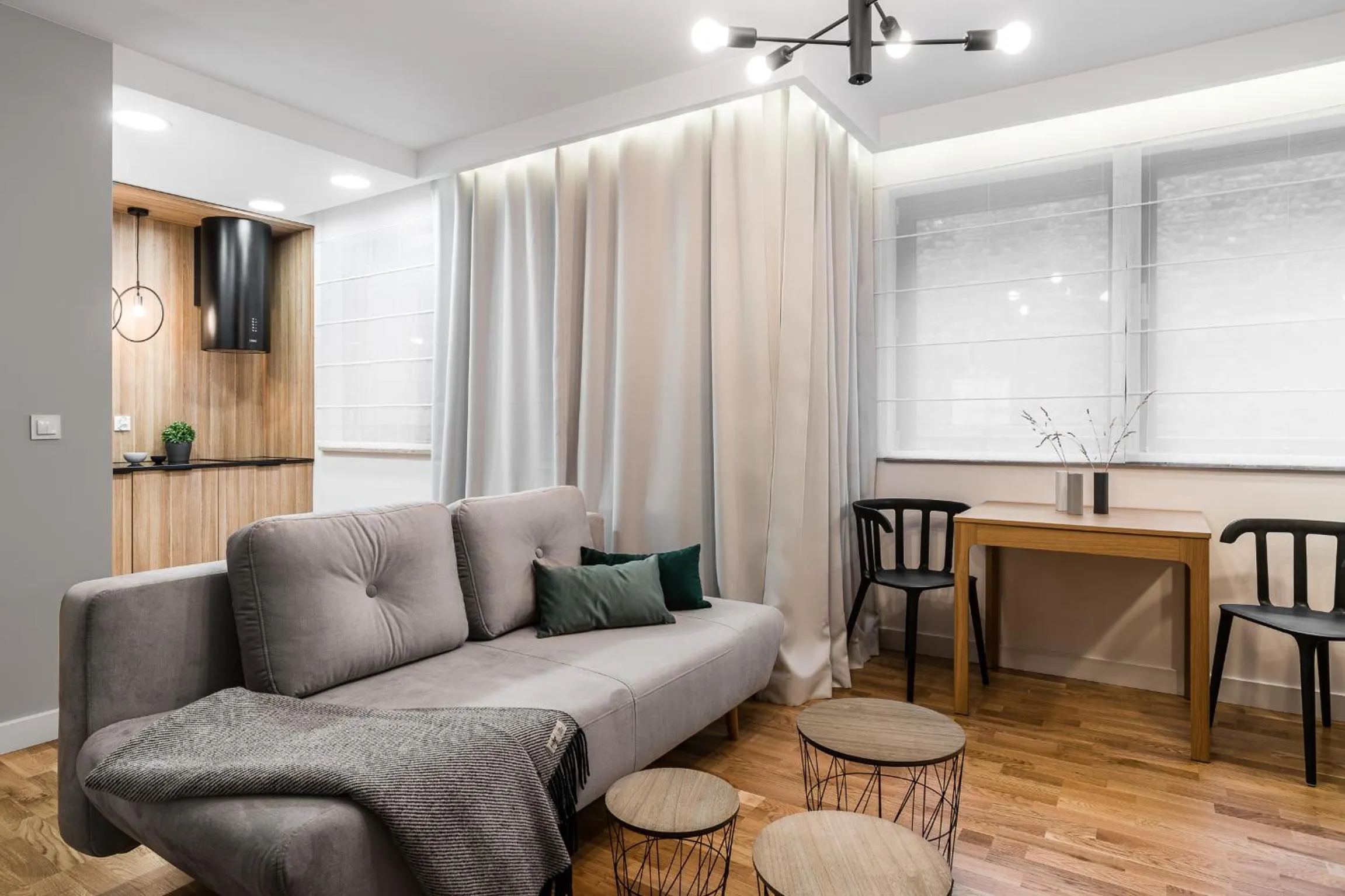 Living room in Waterlane Island - Riverview Pool, SPA, Gym & Parking by Downtown Apartments