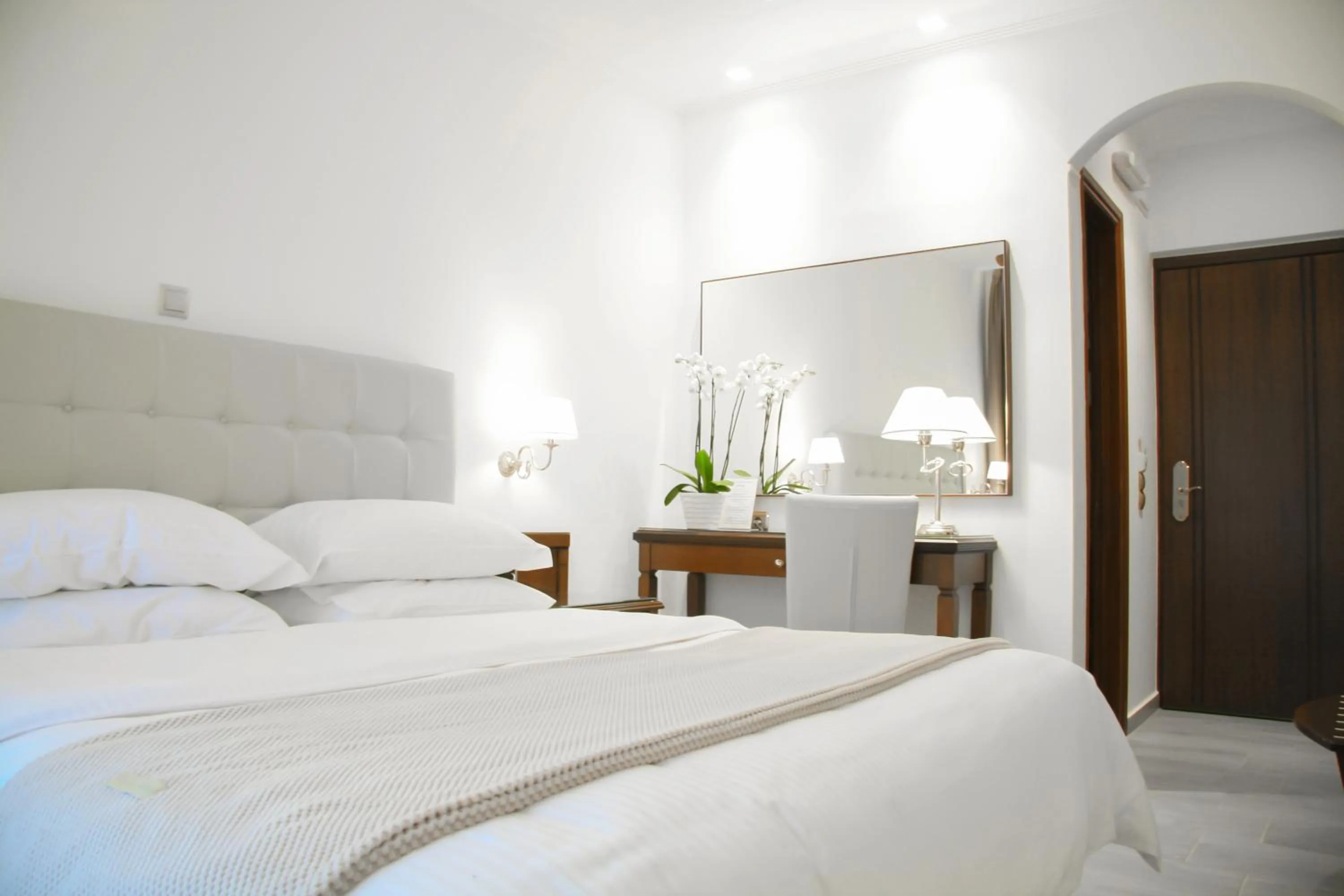 Bed in Armata Boutique Hotel