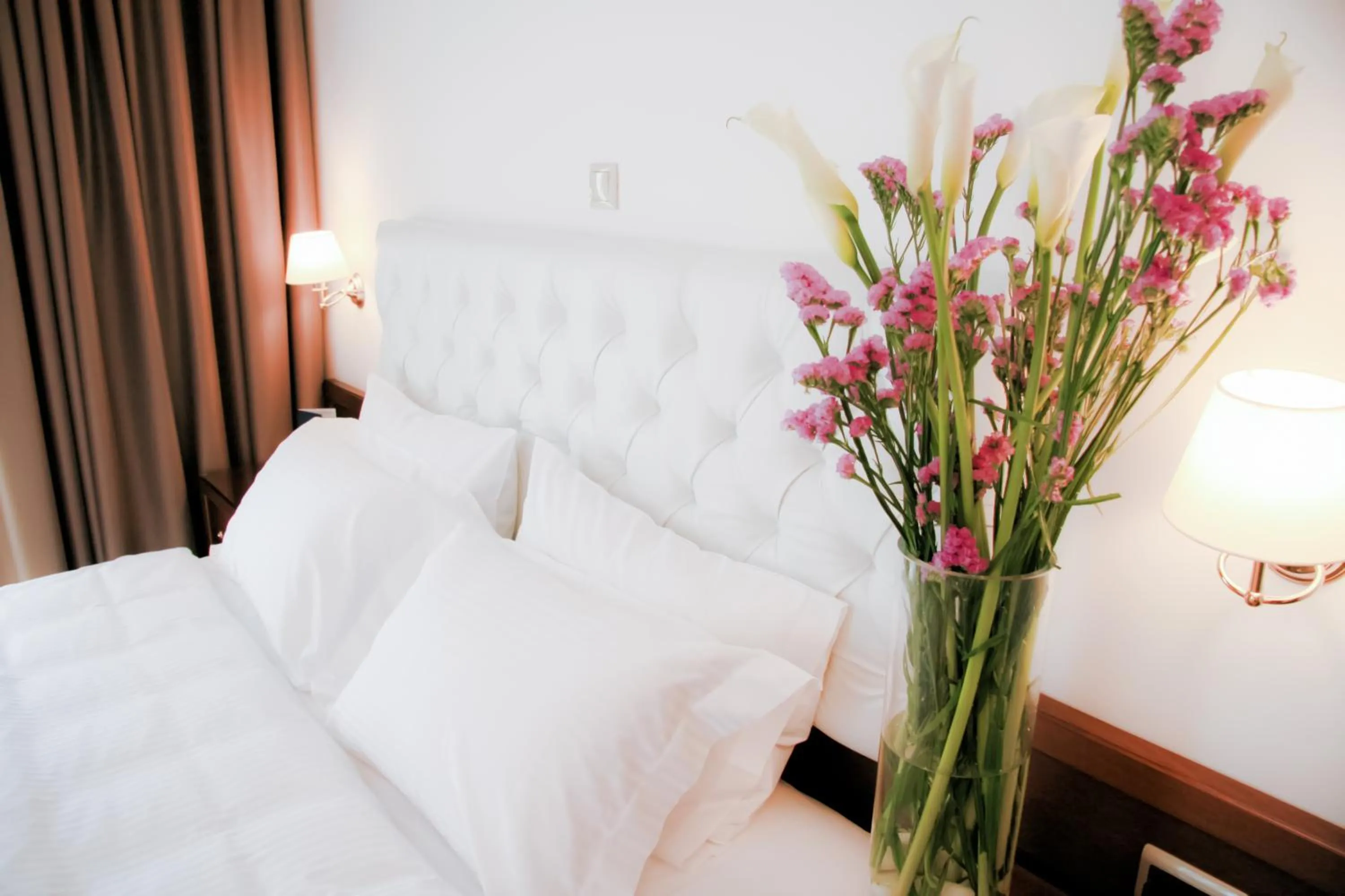 Bed in Armata Boutique Hotel