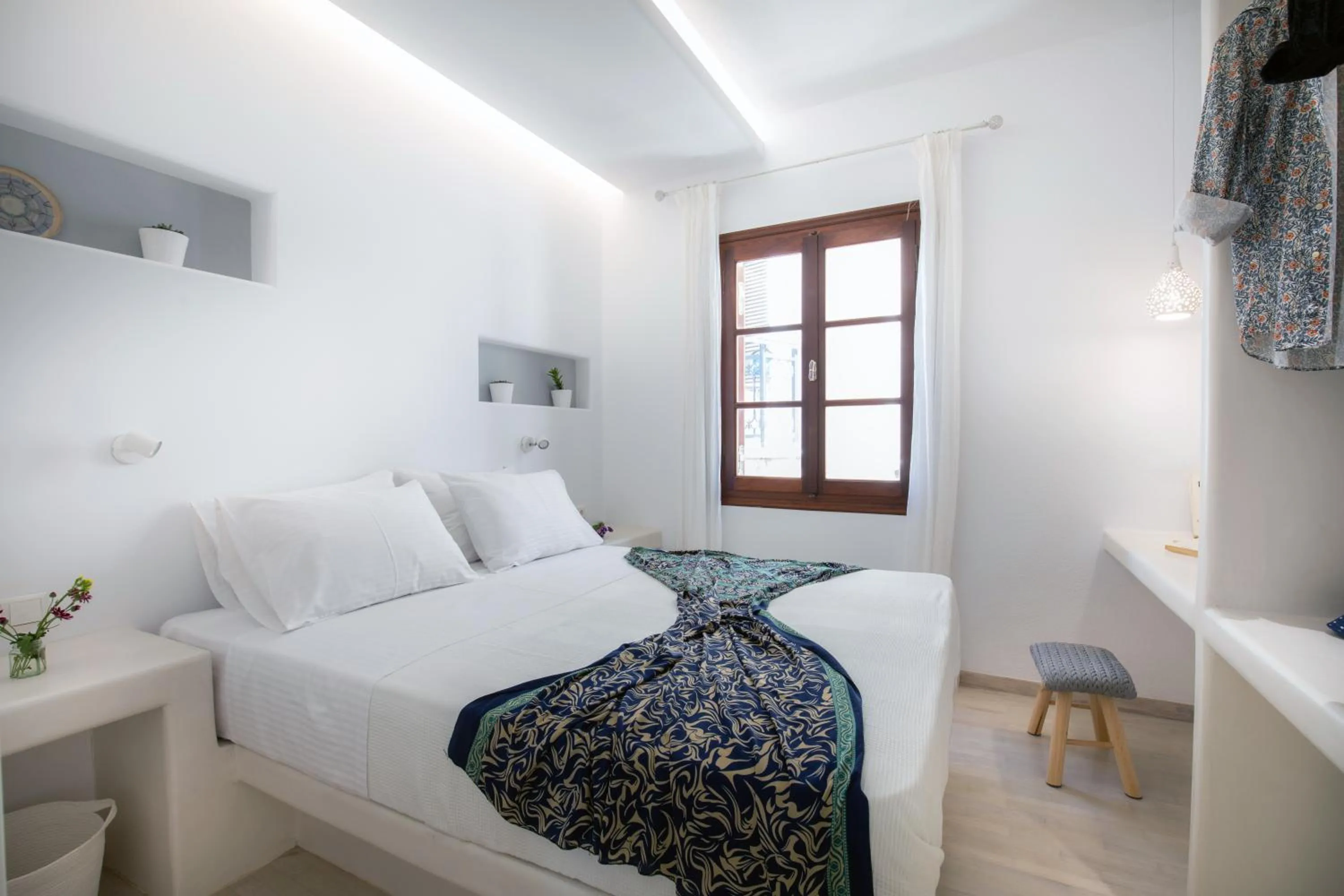 Bed in Arco Naxos Luxury Apartments