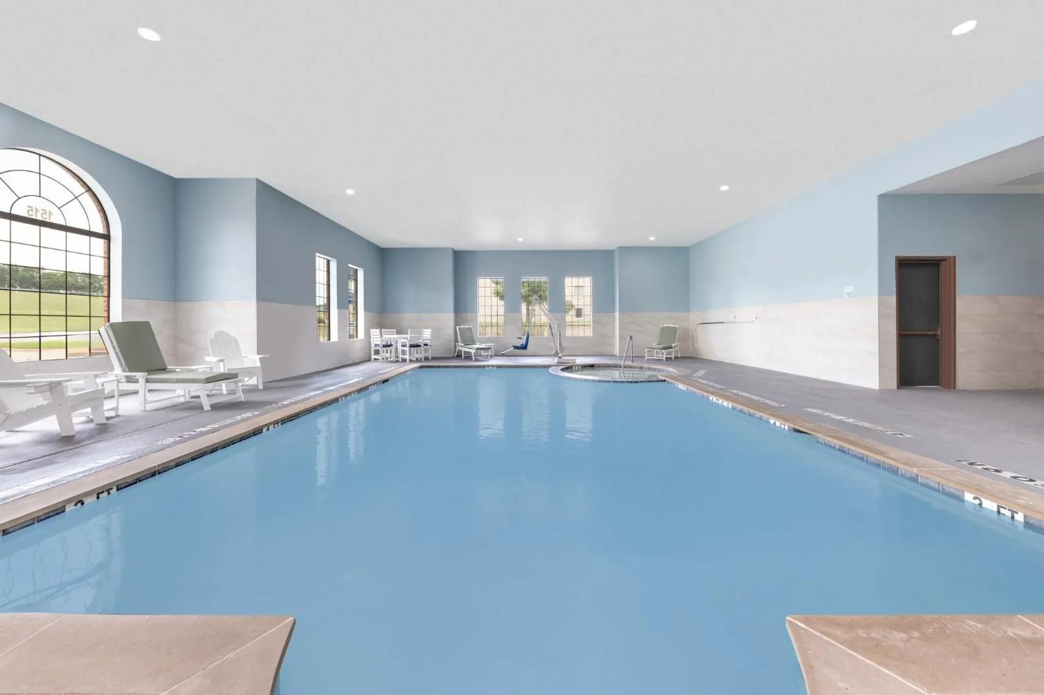 Swimming pool in Holiday Inn Express and Suites Granbury by IHG