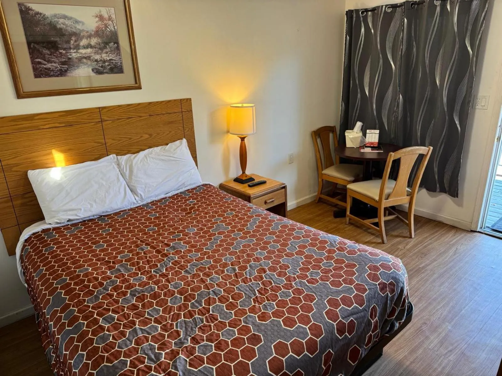 Bedroom, Bed in Economy Inn Cadillac MI by Hotel O