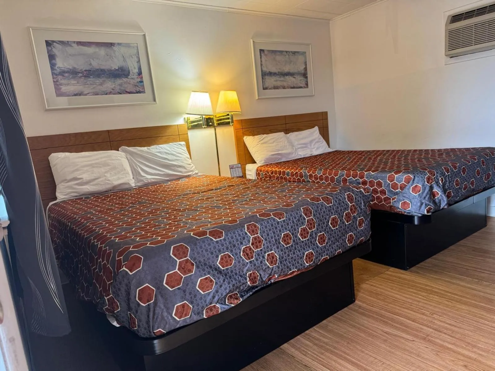 Bedroom, Bed in Economy Inn Cadillac MI by Hotel O