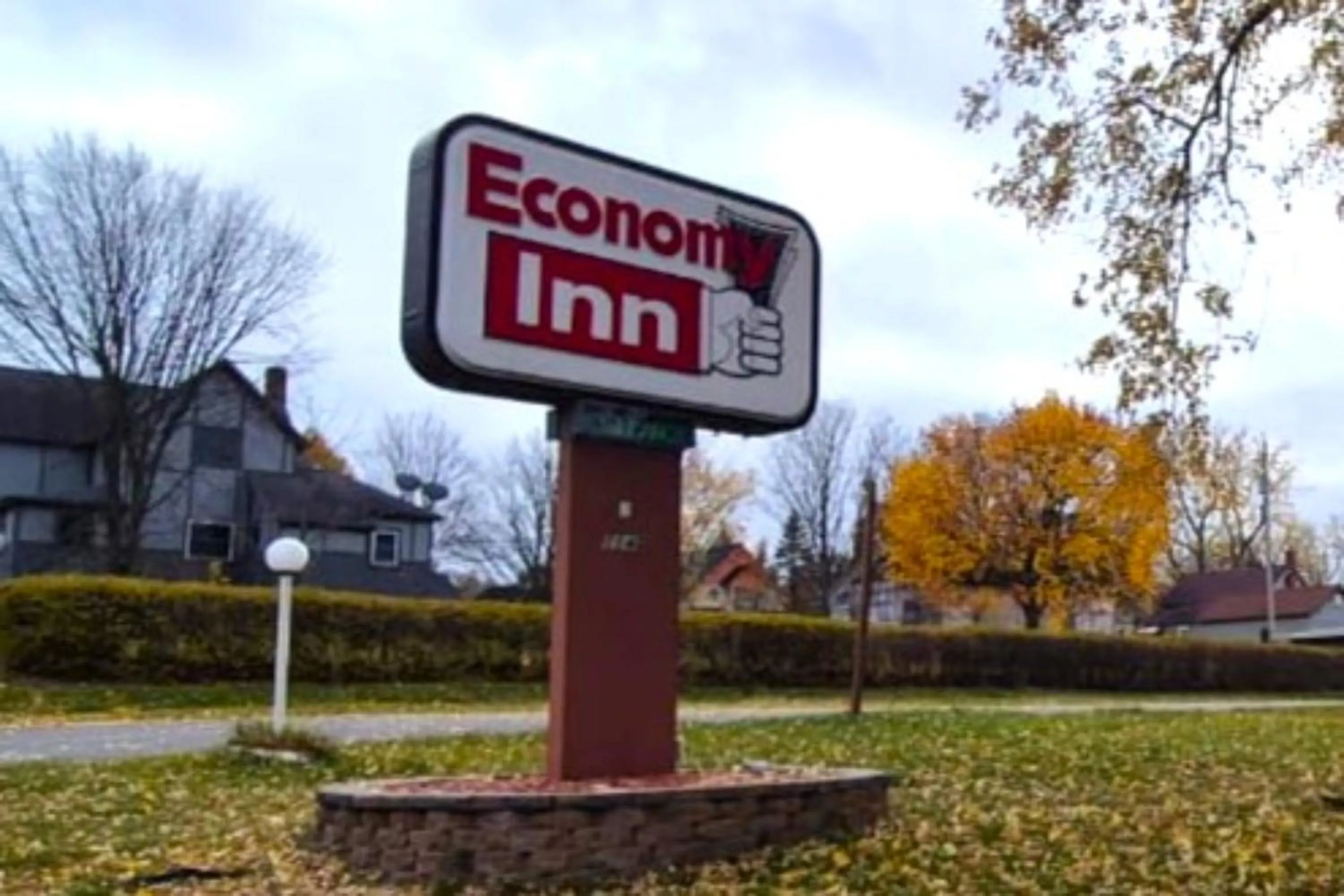 Facade/entrance in Economy Inn Cadillac MI by Hotel O