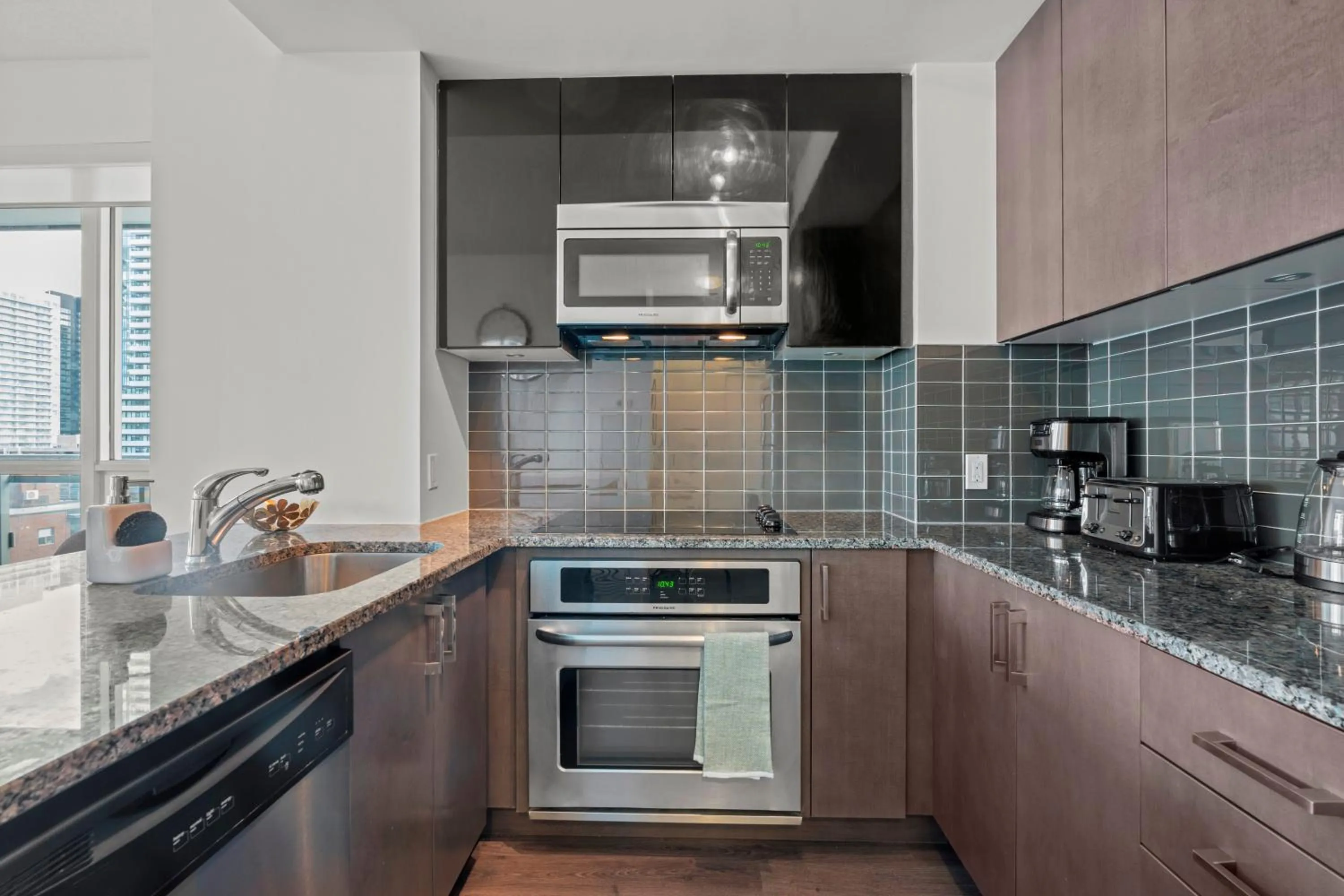 Kitchen or kitchenette in Modern Lillian St Apartments by GLOBALSTAY