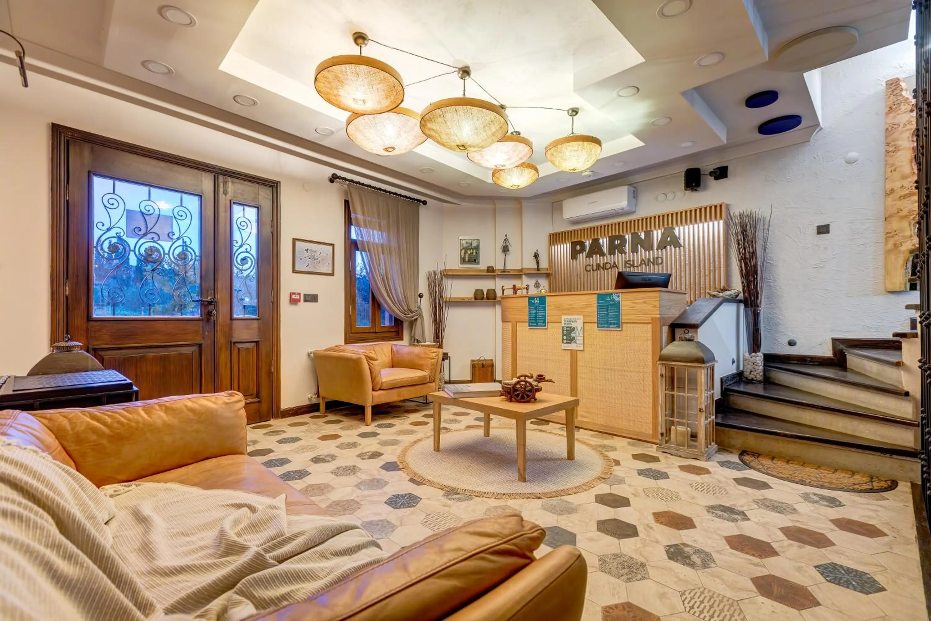 Lobby or reception in Parna Hotel