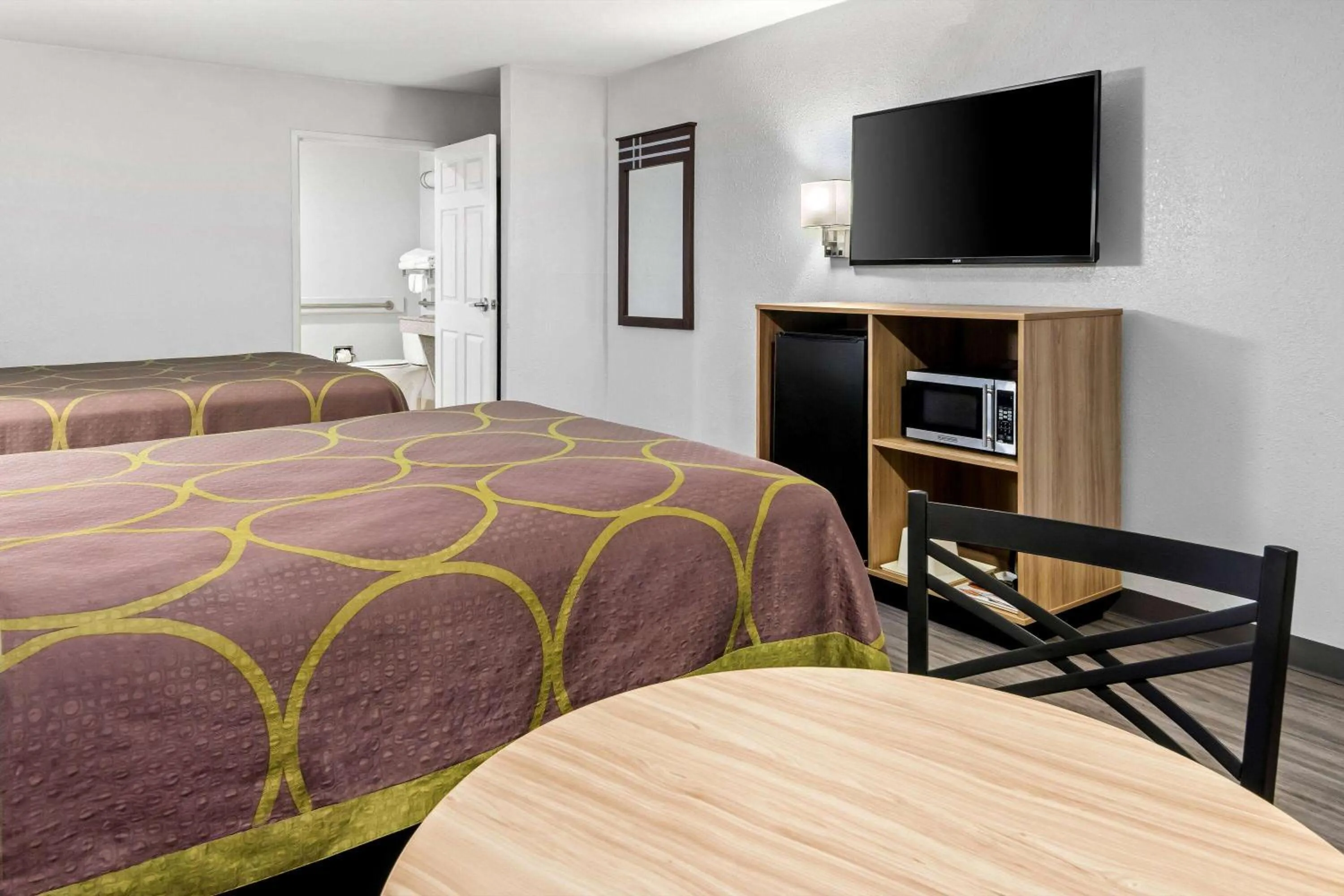 Bed in Super 8 by Wyndham Grand Prairie Southwest