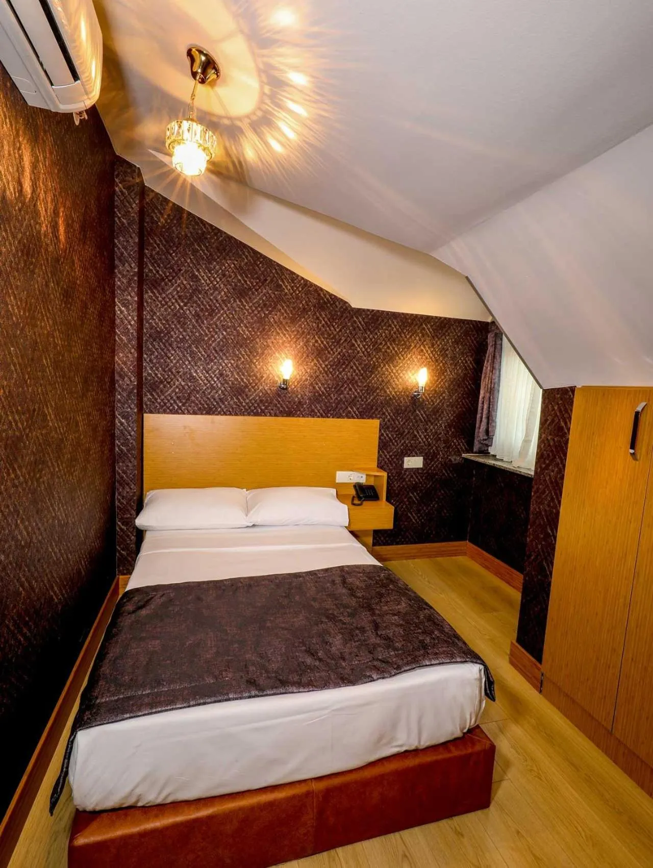 Bedroom in Grand Elmira Suites