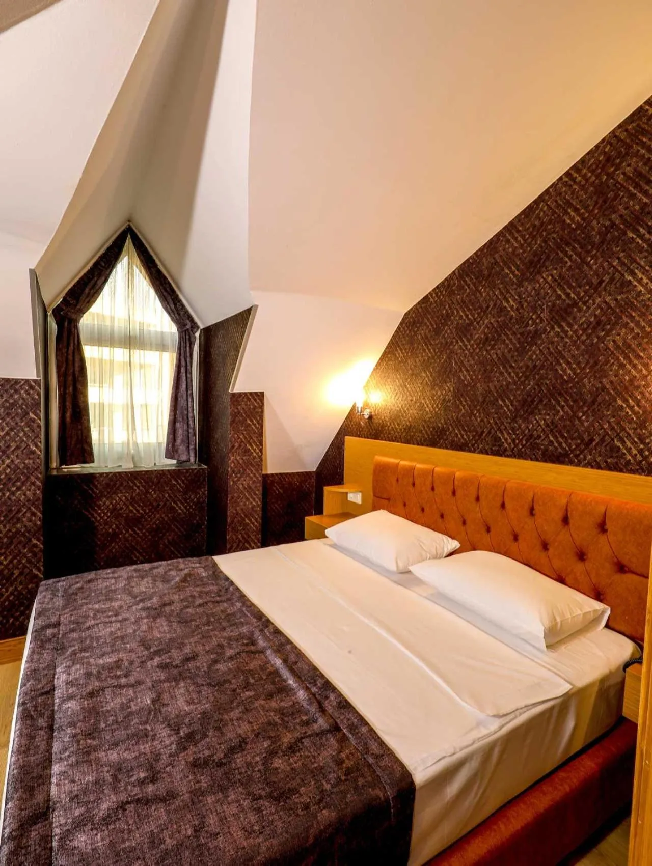 Bedroom in Grand Elmira Suites