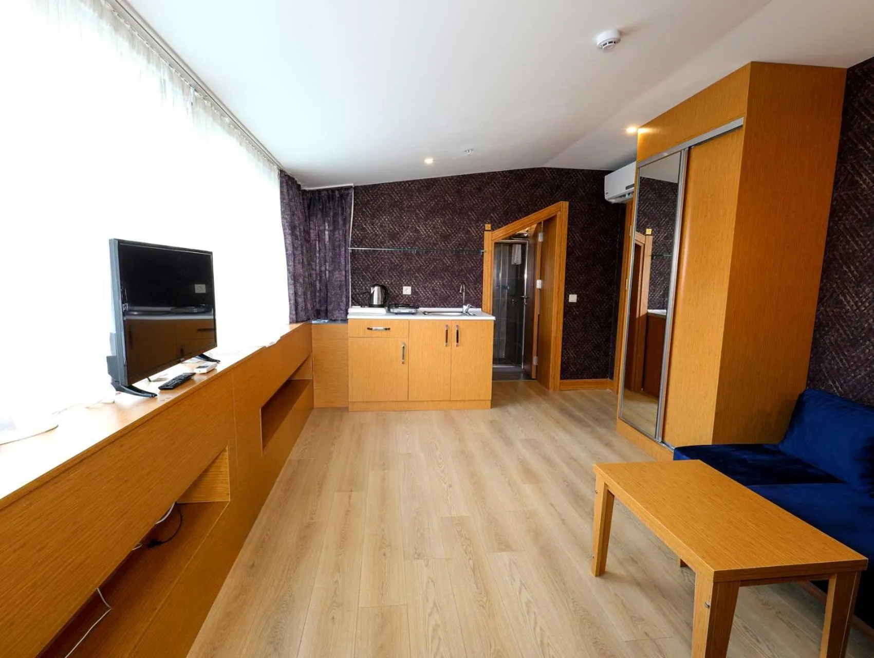 Seating area in Grand Elmira Suites