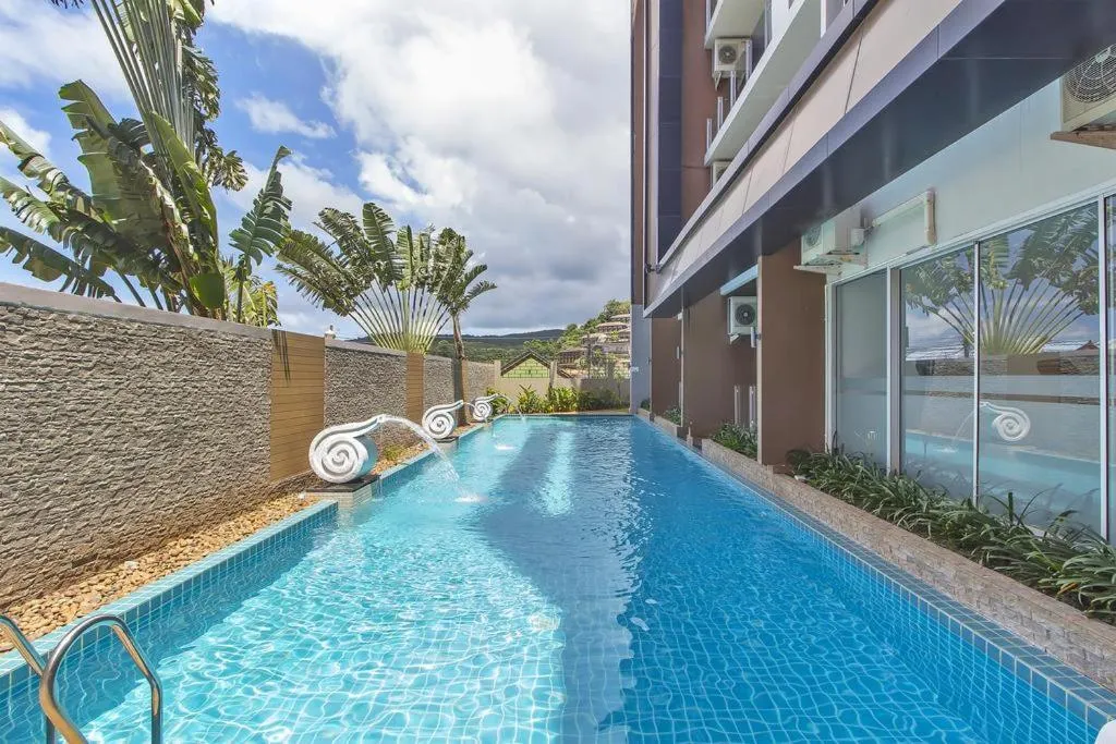 Swimming pool in Chic Condo by RESAVA