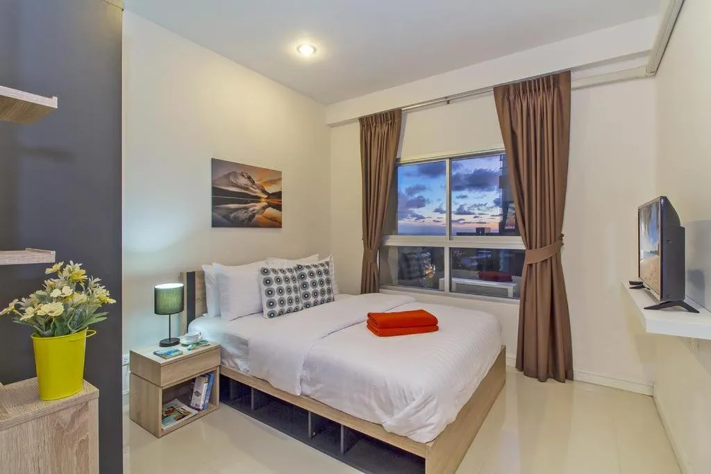 Bedroom, Bed in Chic Condo by RESAVA