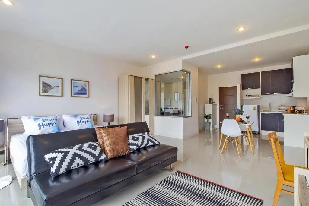 Living room in Chic Condo by RESAVA