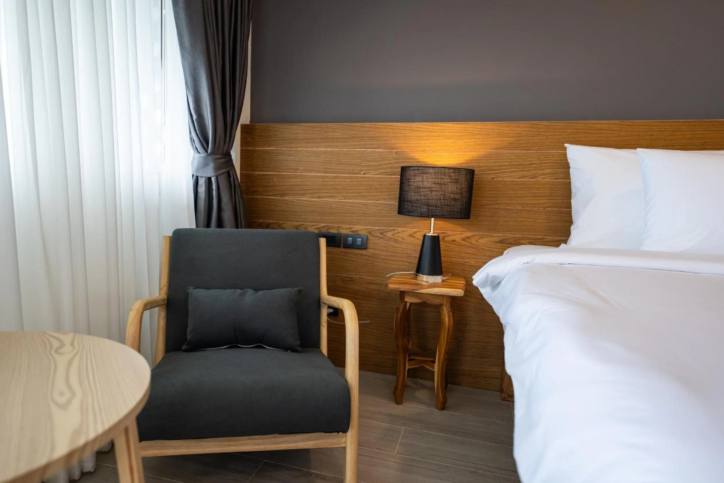 Seating area, Bed in Vikasa Yoga Retreat