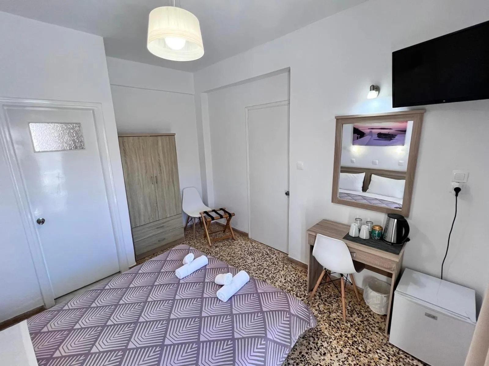 Bed in Firaxenia rooms