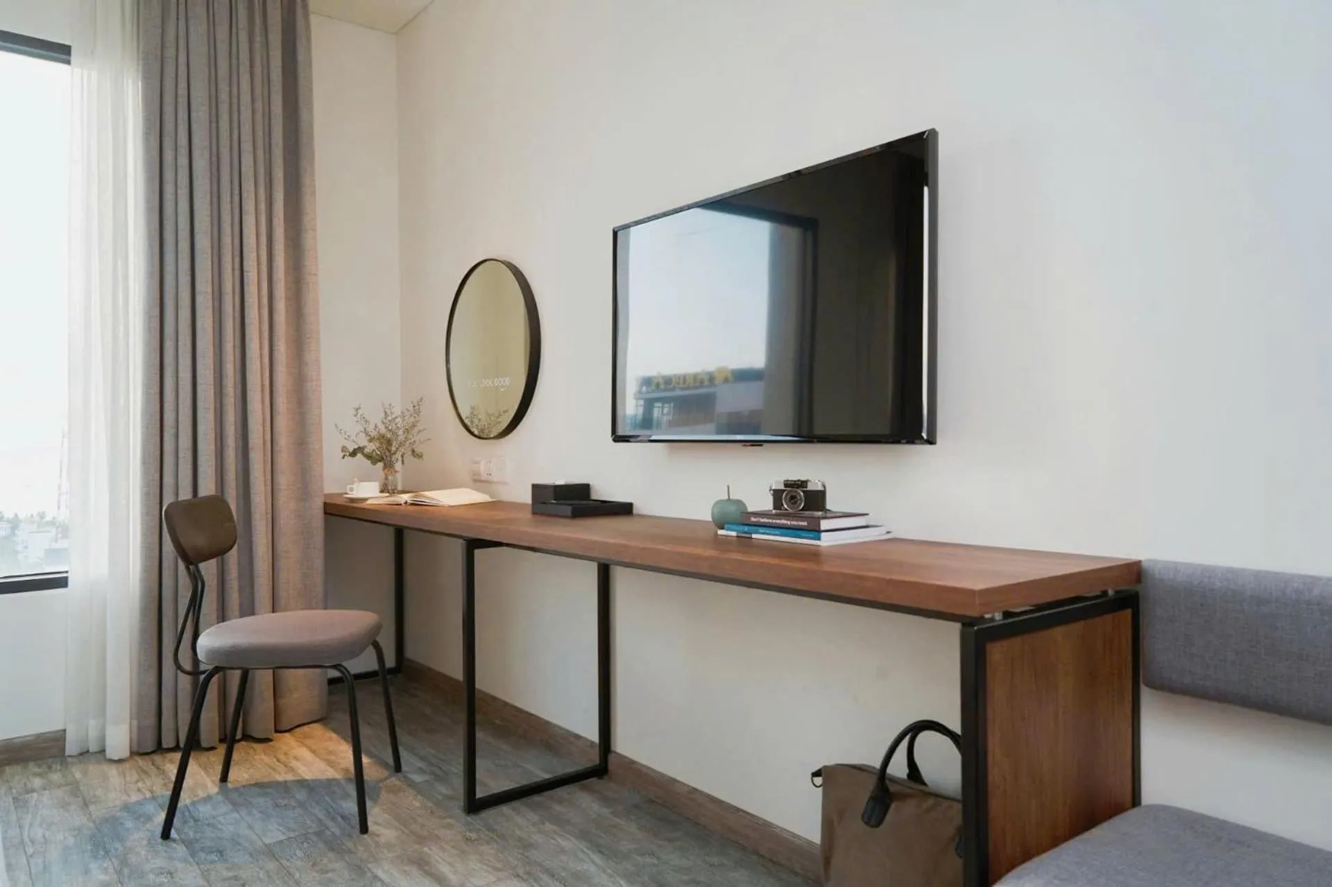 TV and multimedia in Em Oi Boutique Hotel