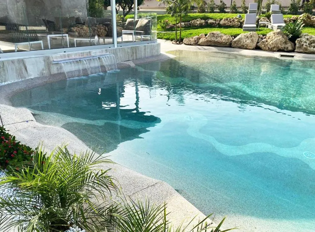 Swimming pool in Suite Hotel L'Oasi di Riaci