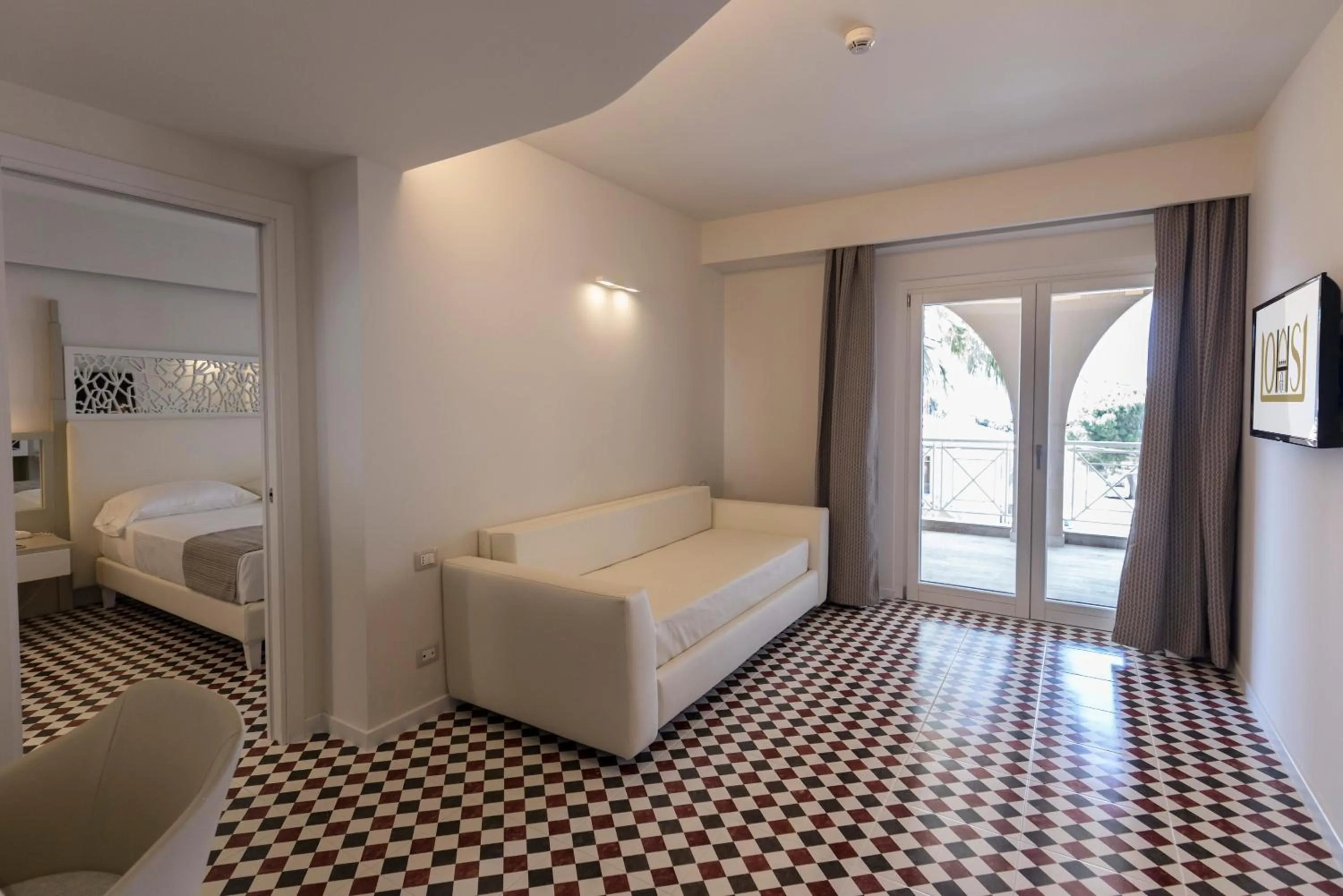 Living room, Bed in Suite Hotel L'Oasi di Riaci