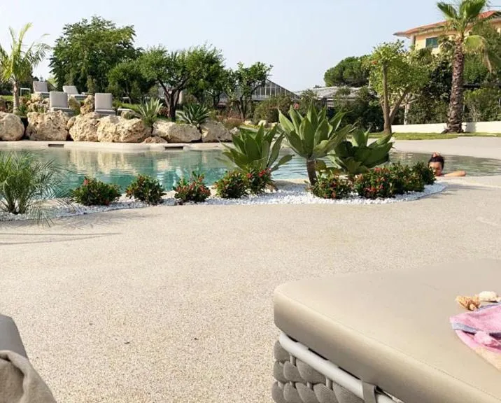 Swimming pool in Suite Hotel L'Oasi di Riaci