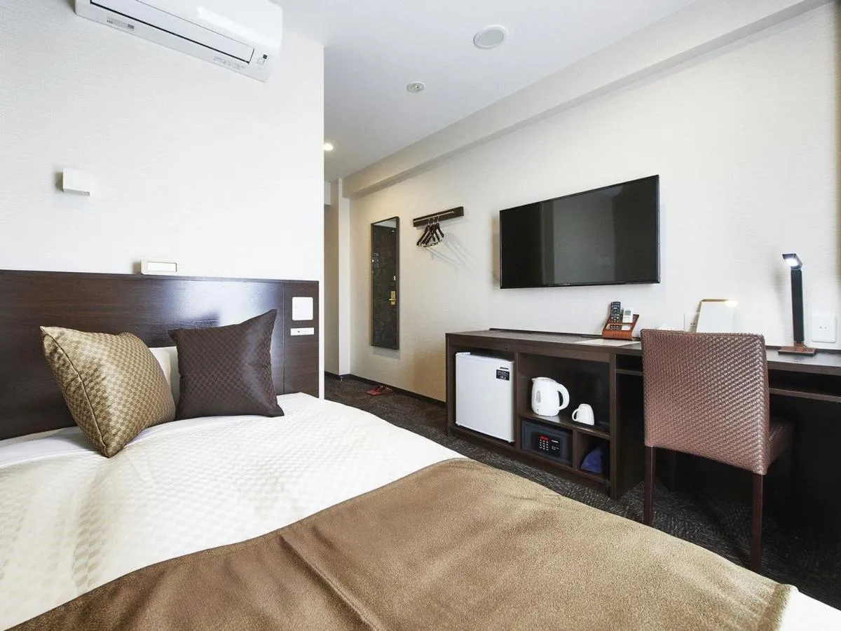 Bed in The Celecton Omiya Kaisoku Kitamoto Ekimae