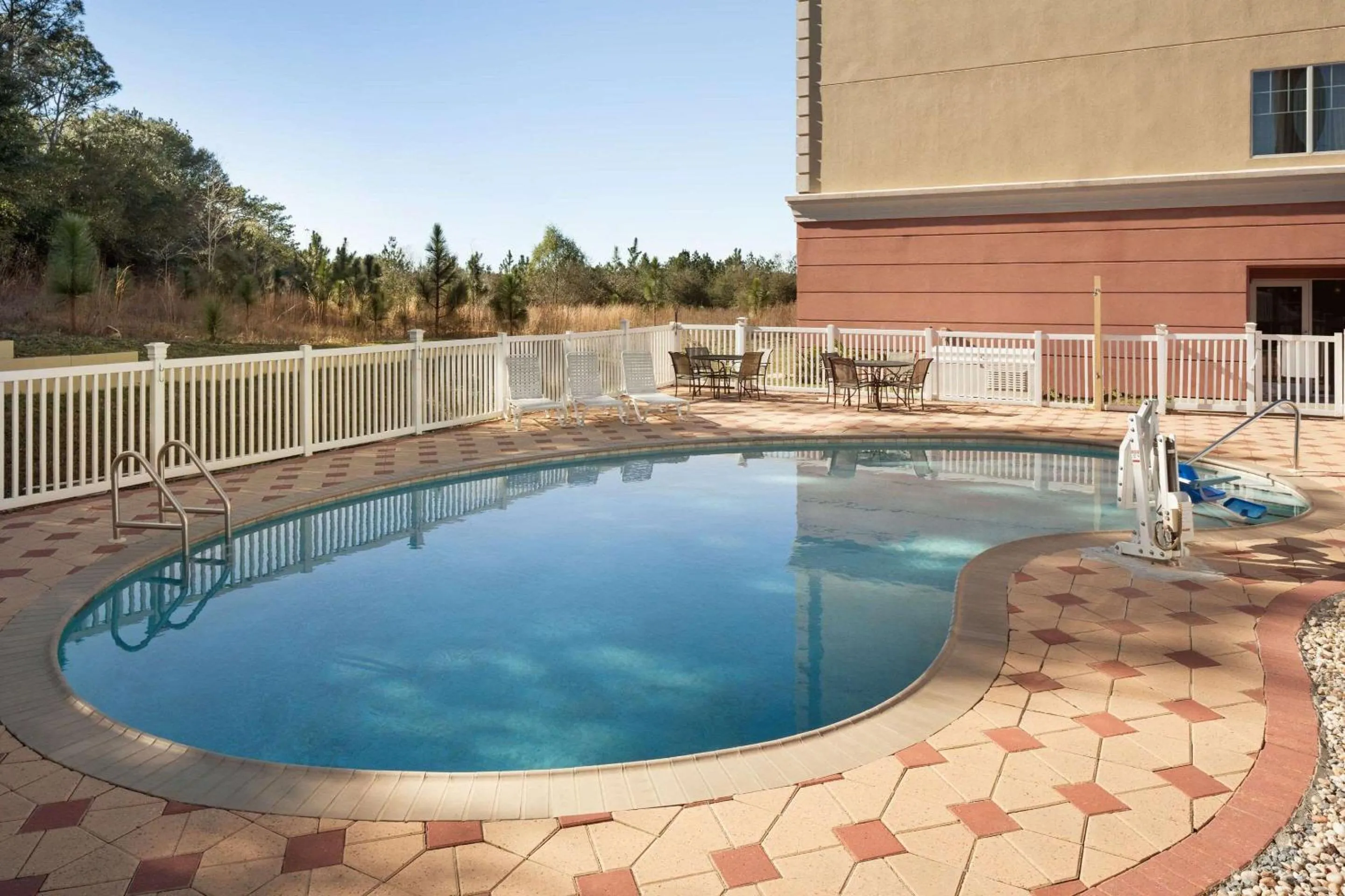 Swimming pool in Country Inn & Suites by Radisson, Crestview, FL