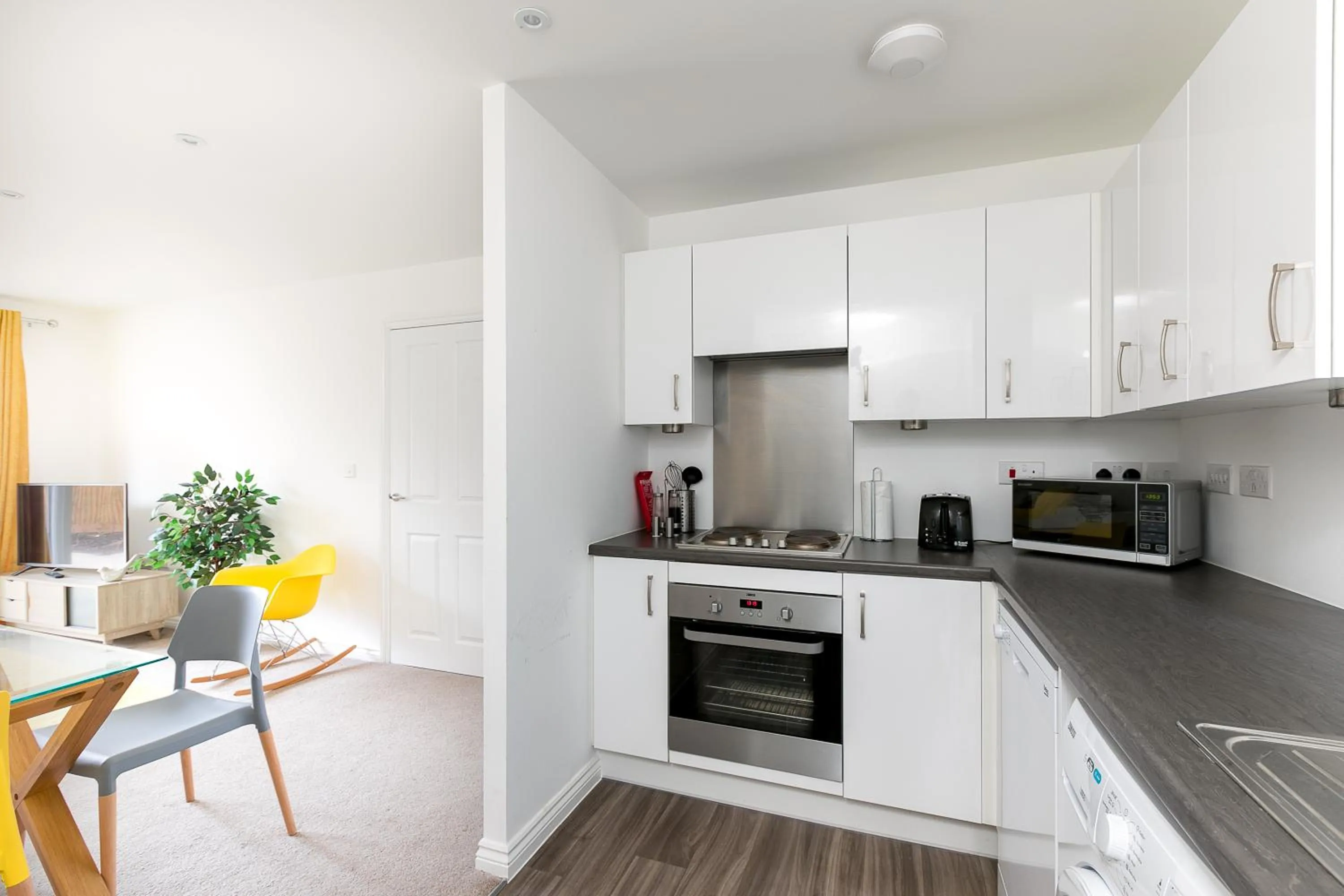 Kitchen or kitchenette in Hertford Serviced Apartments by Payman Club