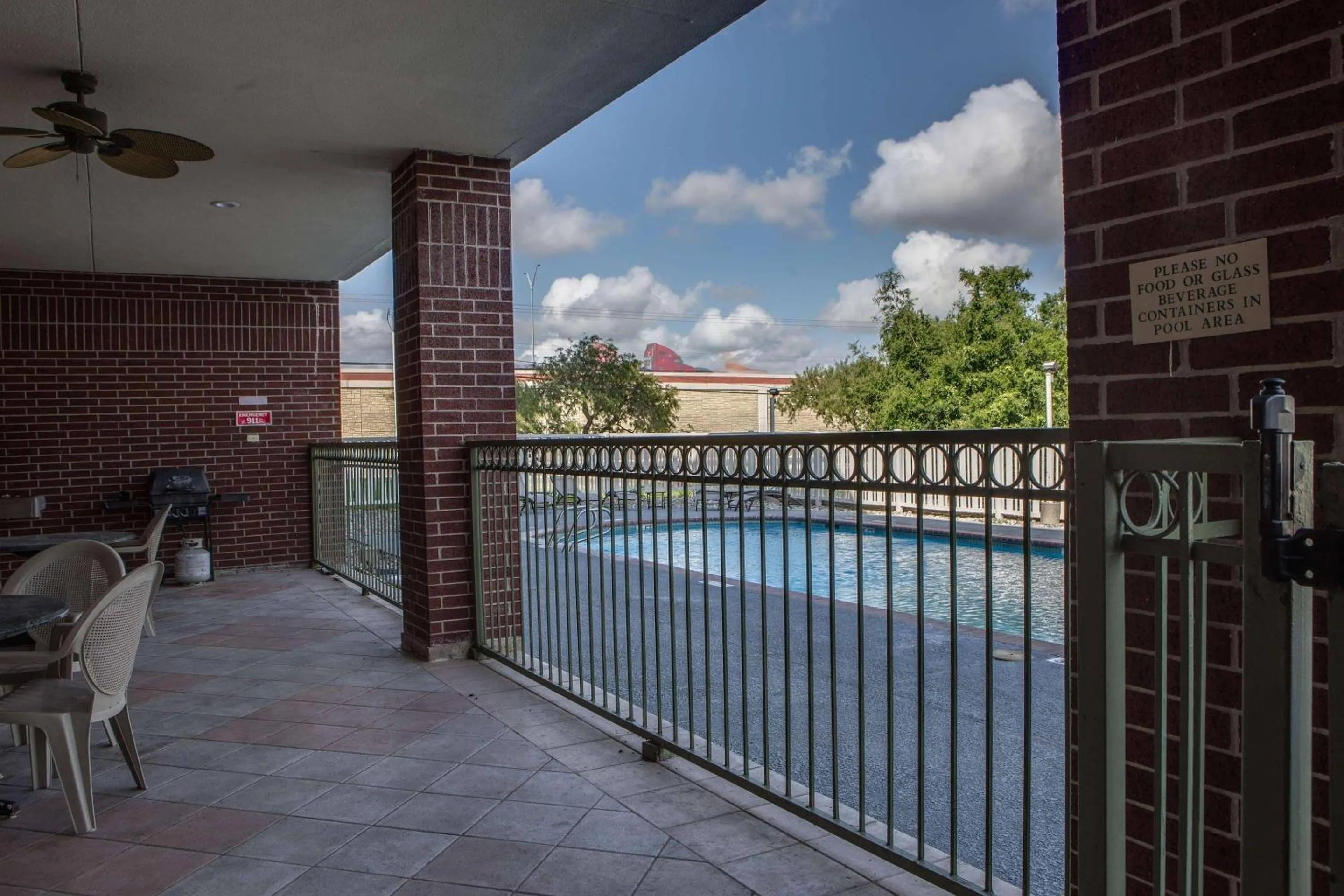 Swimming pool in Country Inn & Suites by Radisson, Harlingen, TX
