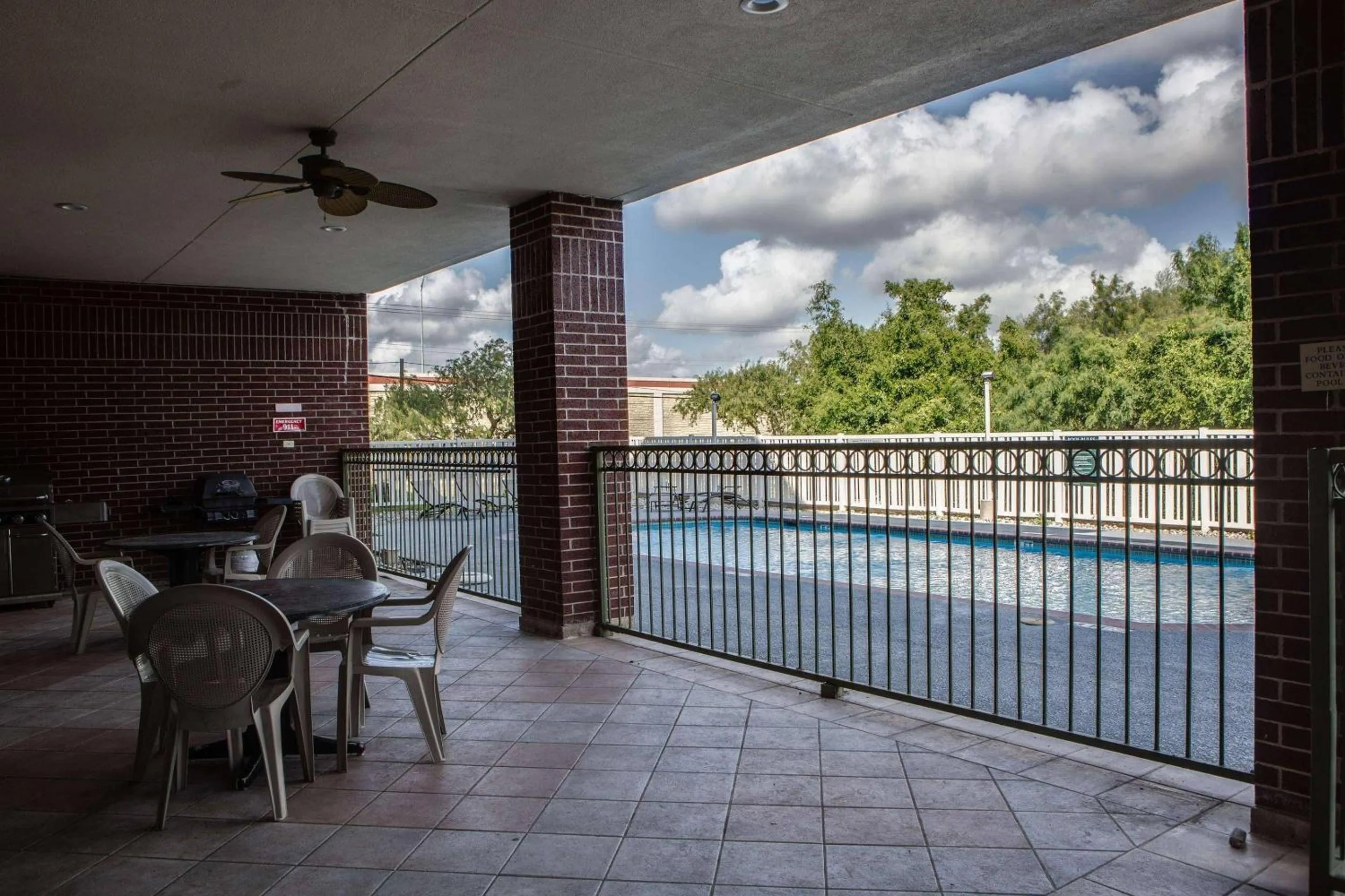 Swimming pool in Country Inn & Suites by Radisson, Harlingen, TX