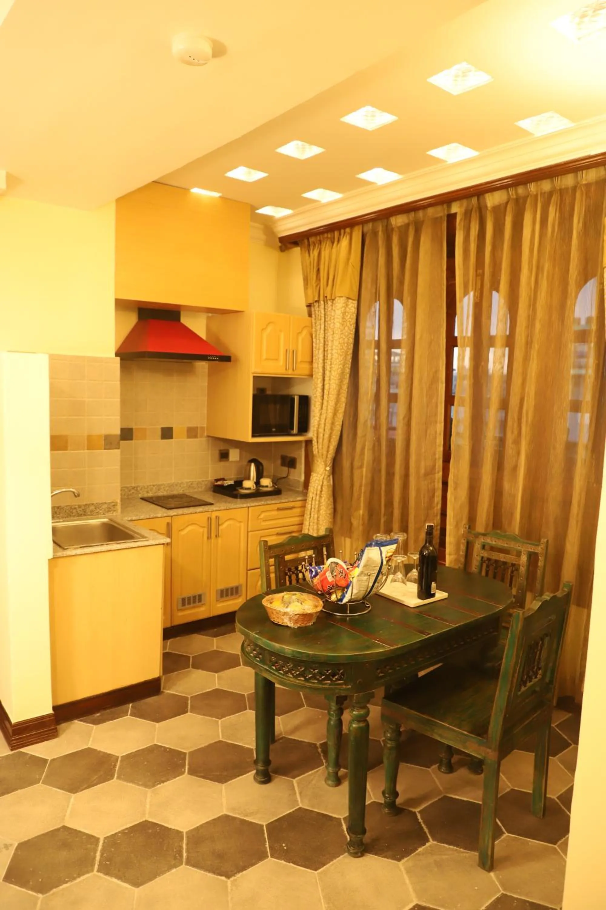 Kitchen or kitchenette in Heritage Hotel Suites and Spa