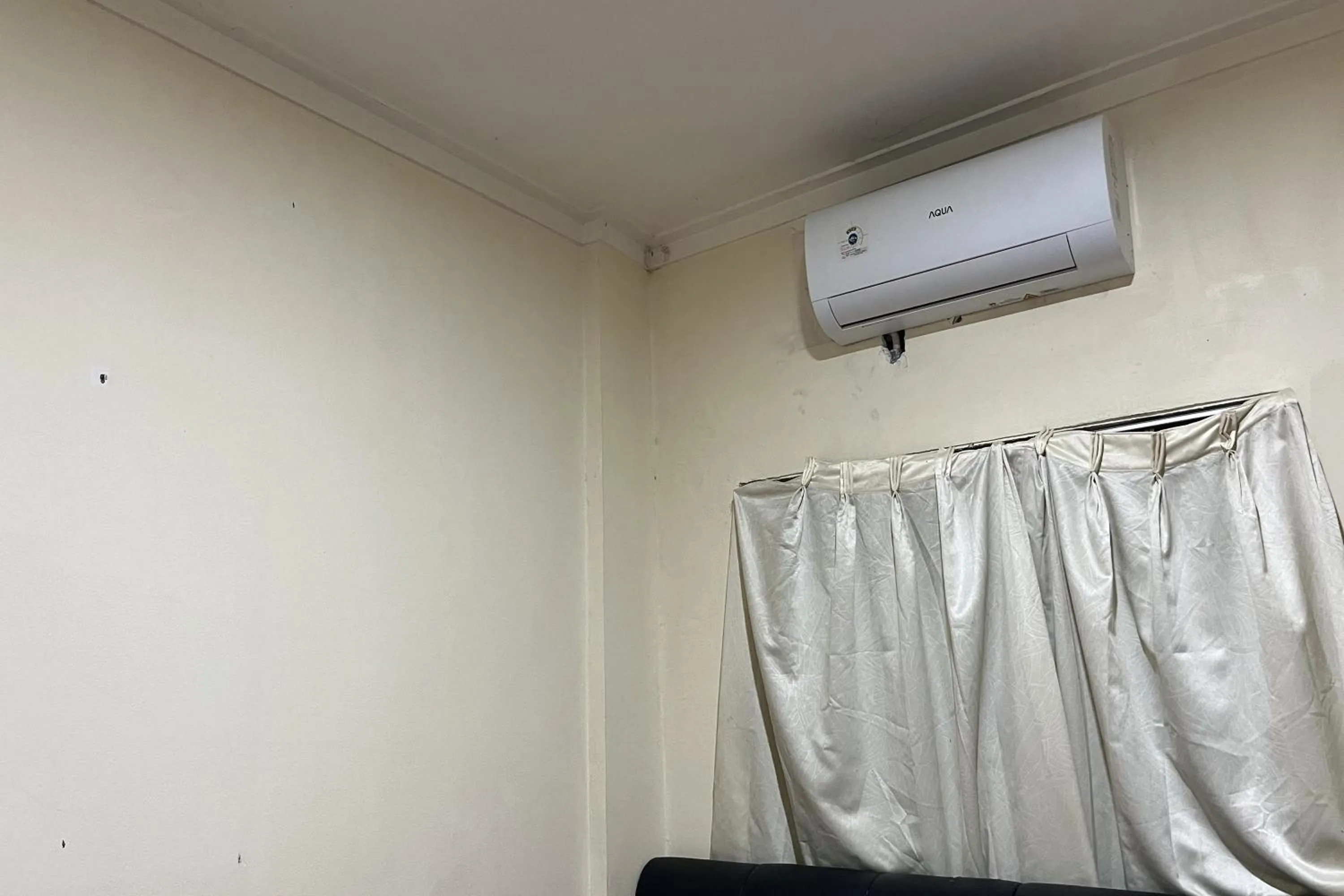 air conditioner, TV/Entertainment Center in Wisma Berkat