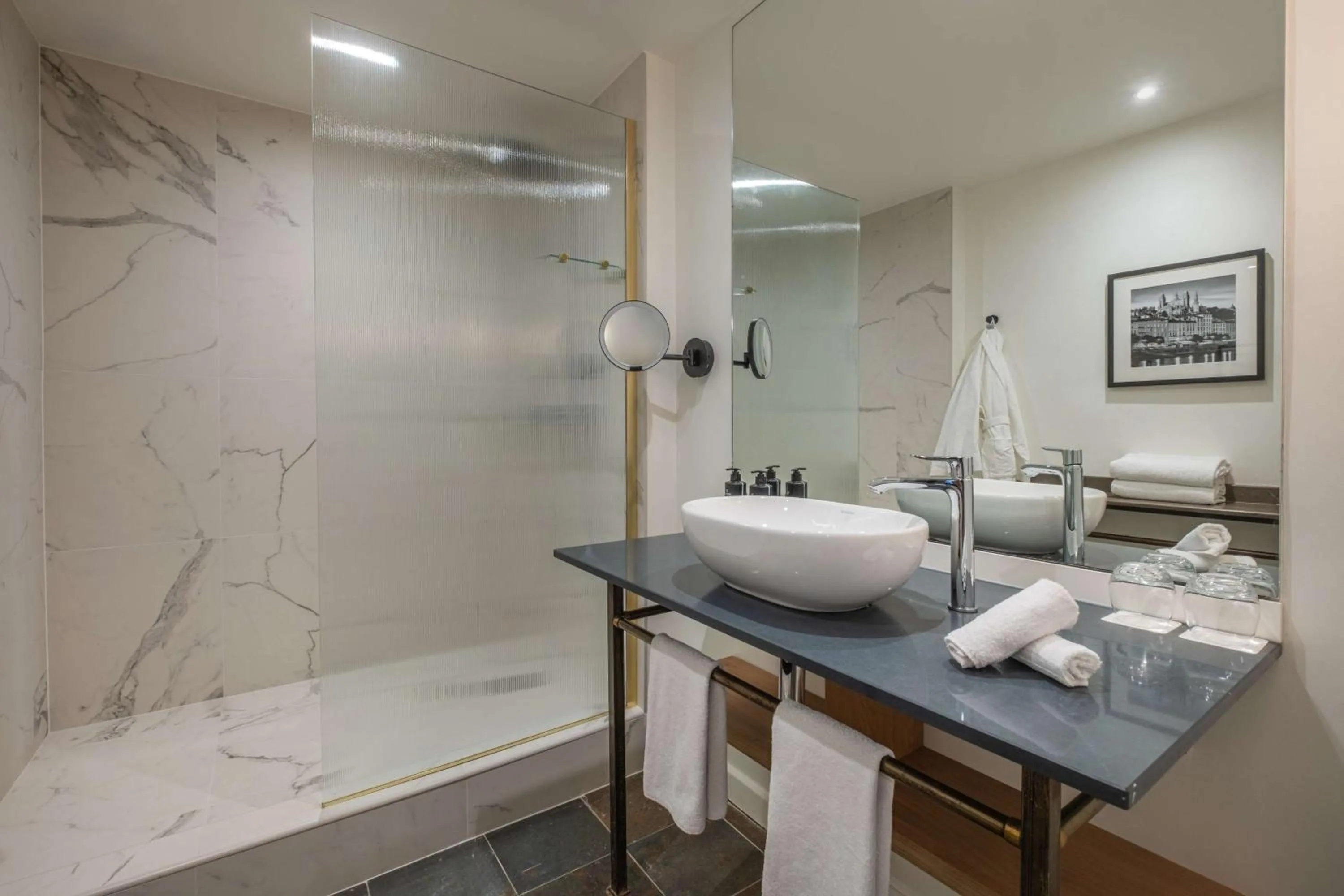 Bathroom in Cour des Loges Lyon, A Radisson Collection Hotel