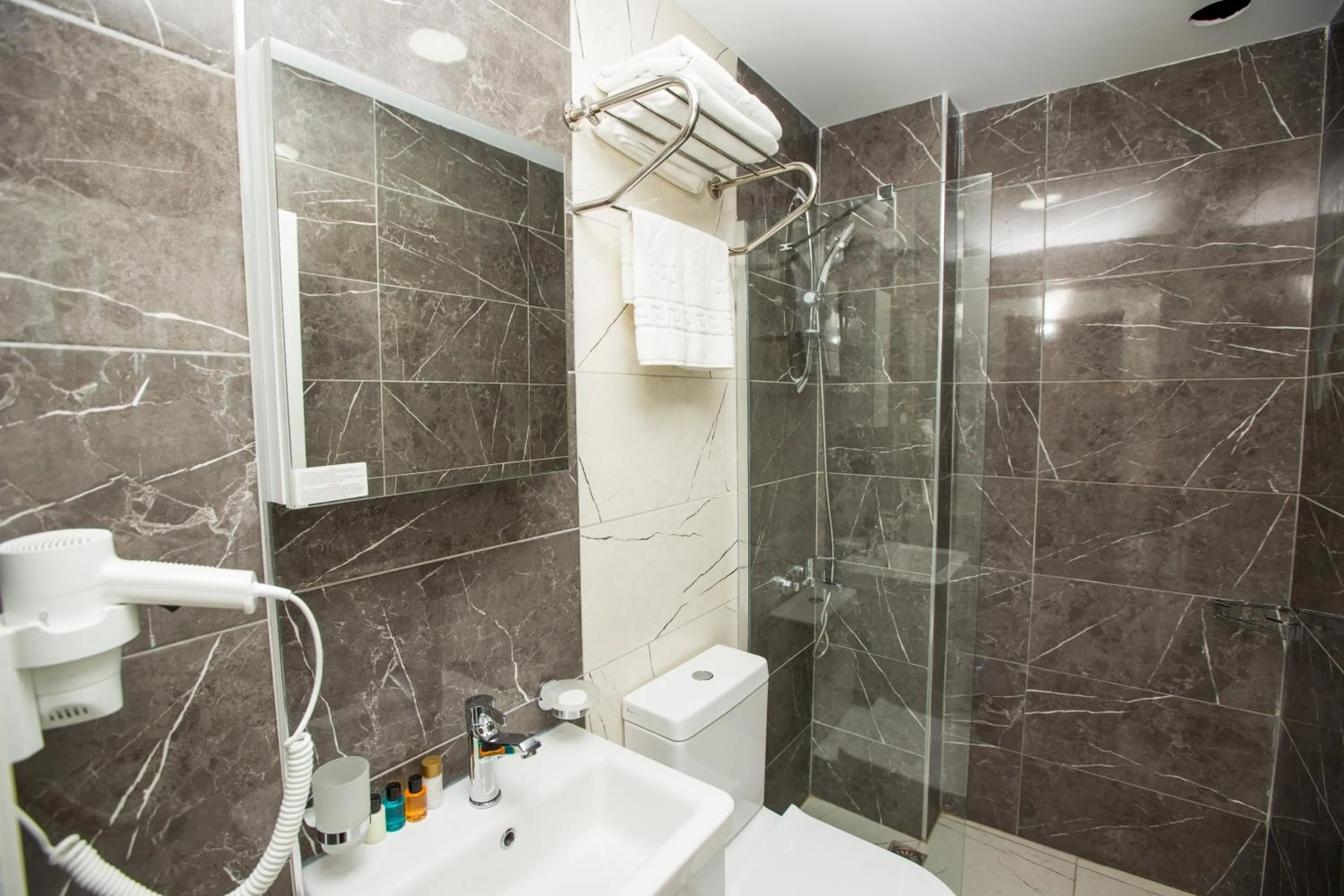 Shower in Corner Garden Hotel