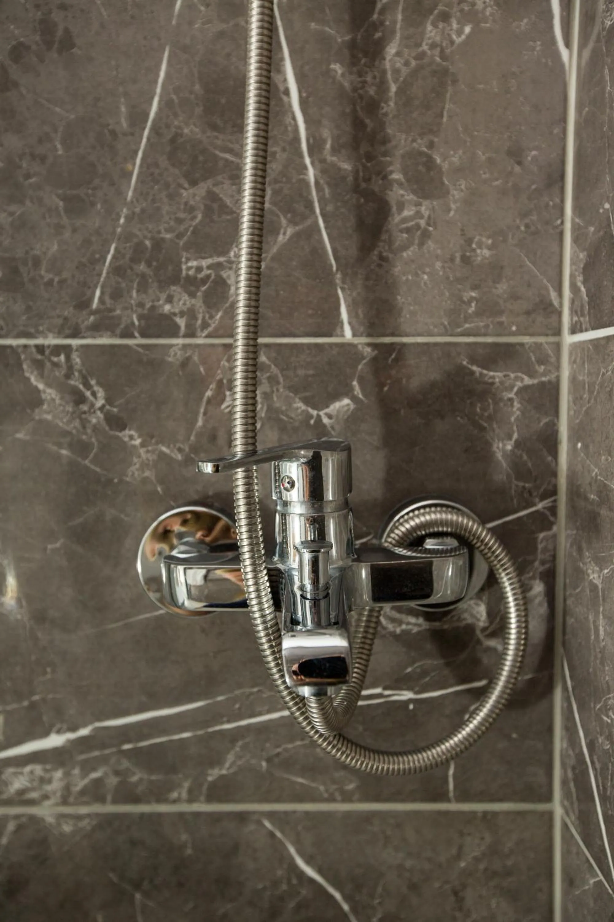 Shower in Corner Garden Hotel