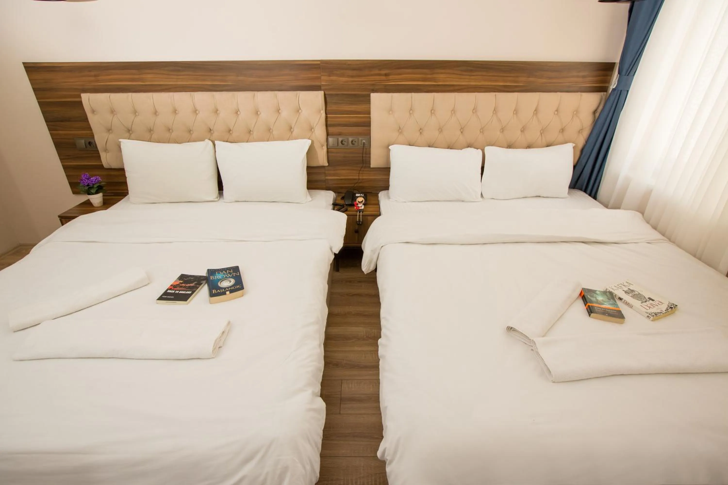 Bed in Corner Garden Hotel