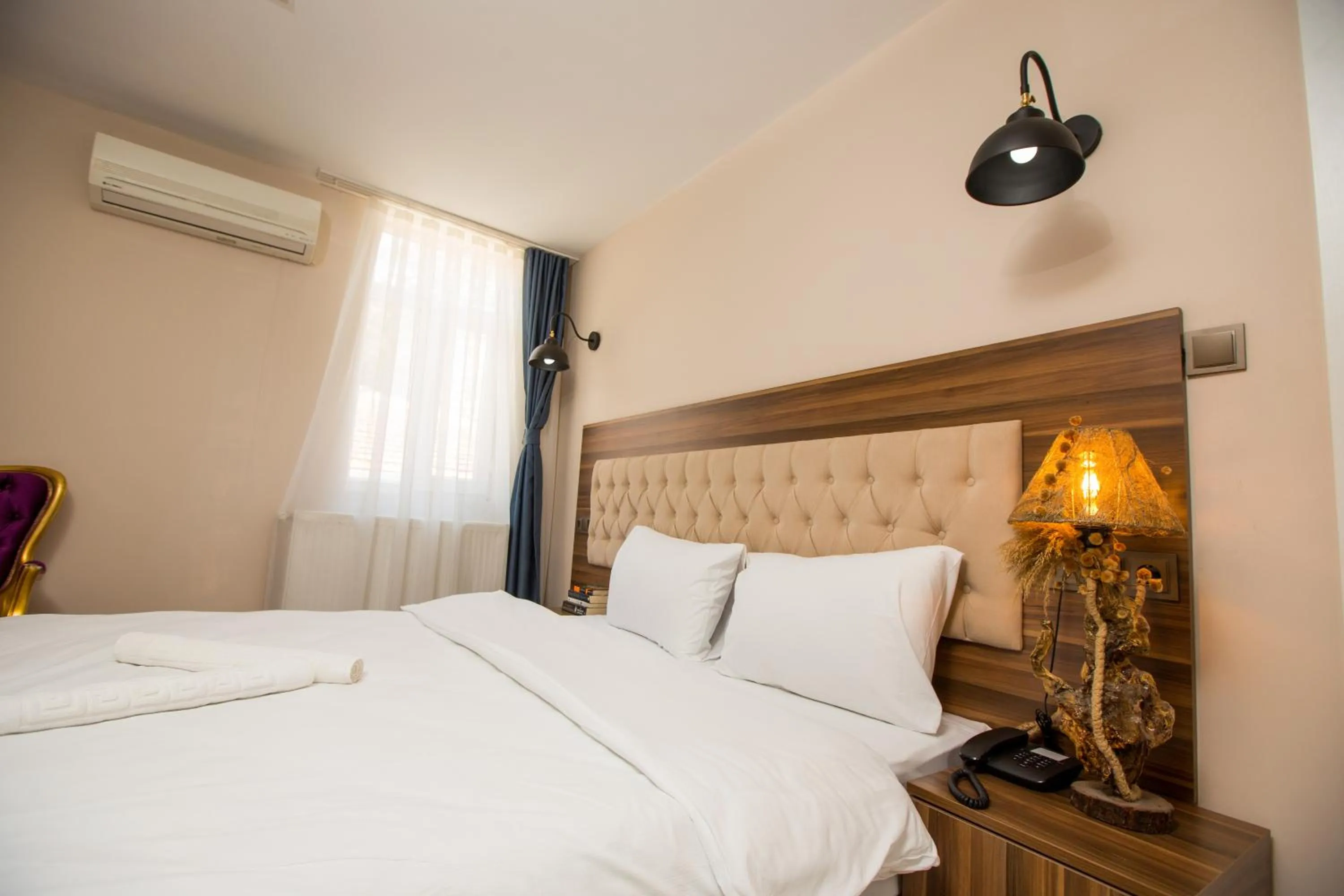 Bed in Corner Garden Hotel