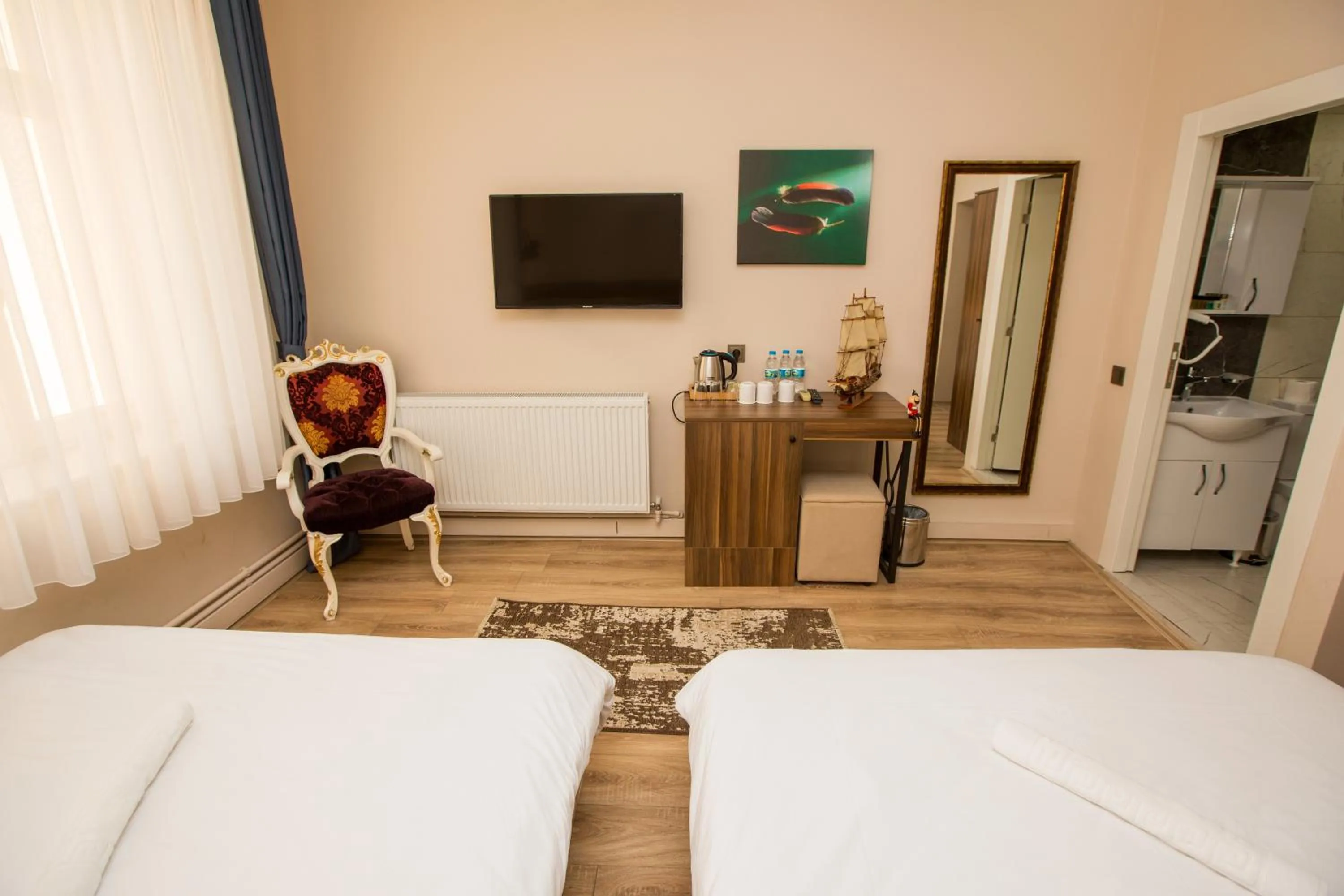 Bed in Corner Garden Hotel