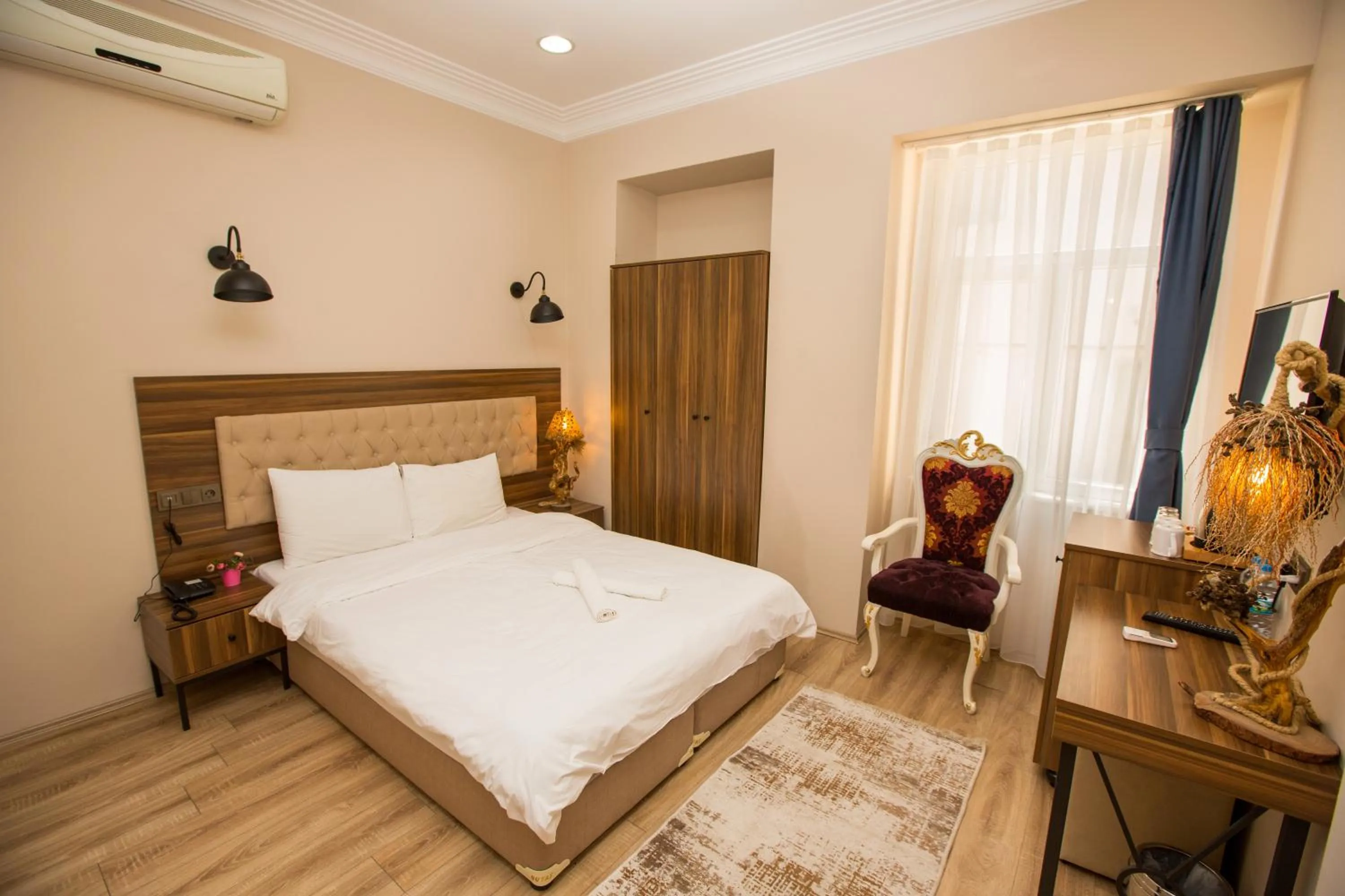 Bed in Corner Garden Hotel