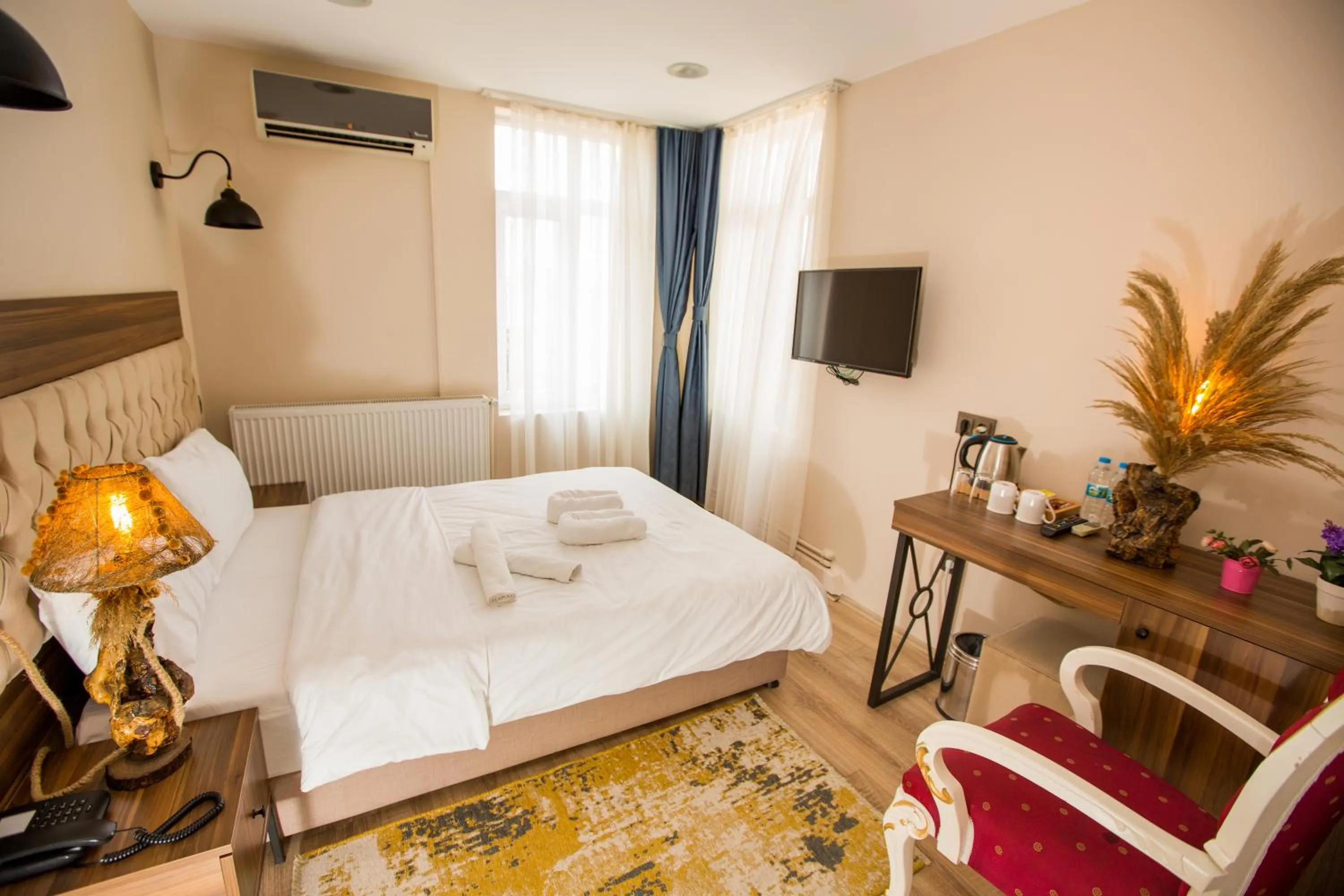 Bed in Corner Garden Hotel