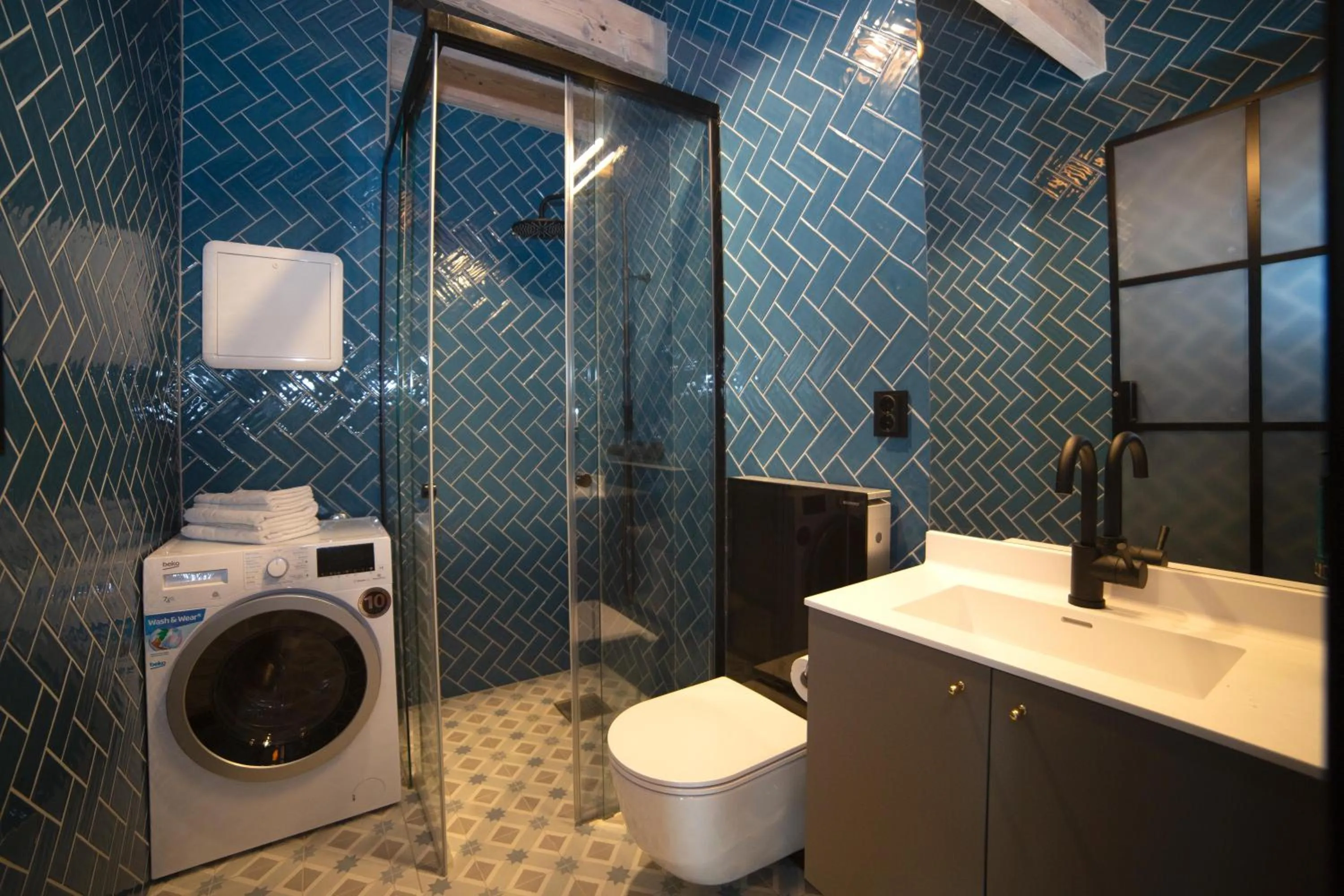 Bathroom in Home Again Apartments Kirkegata