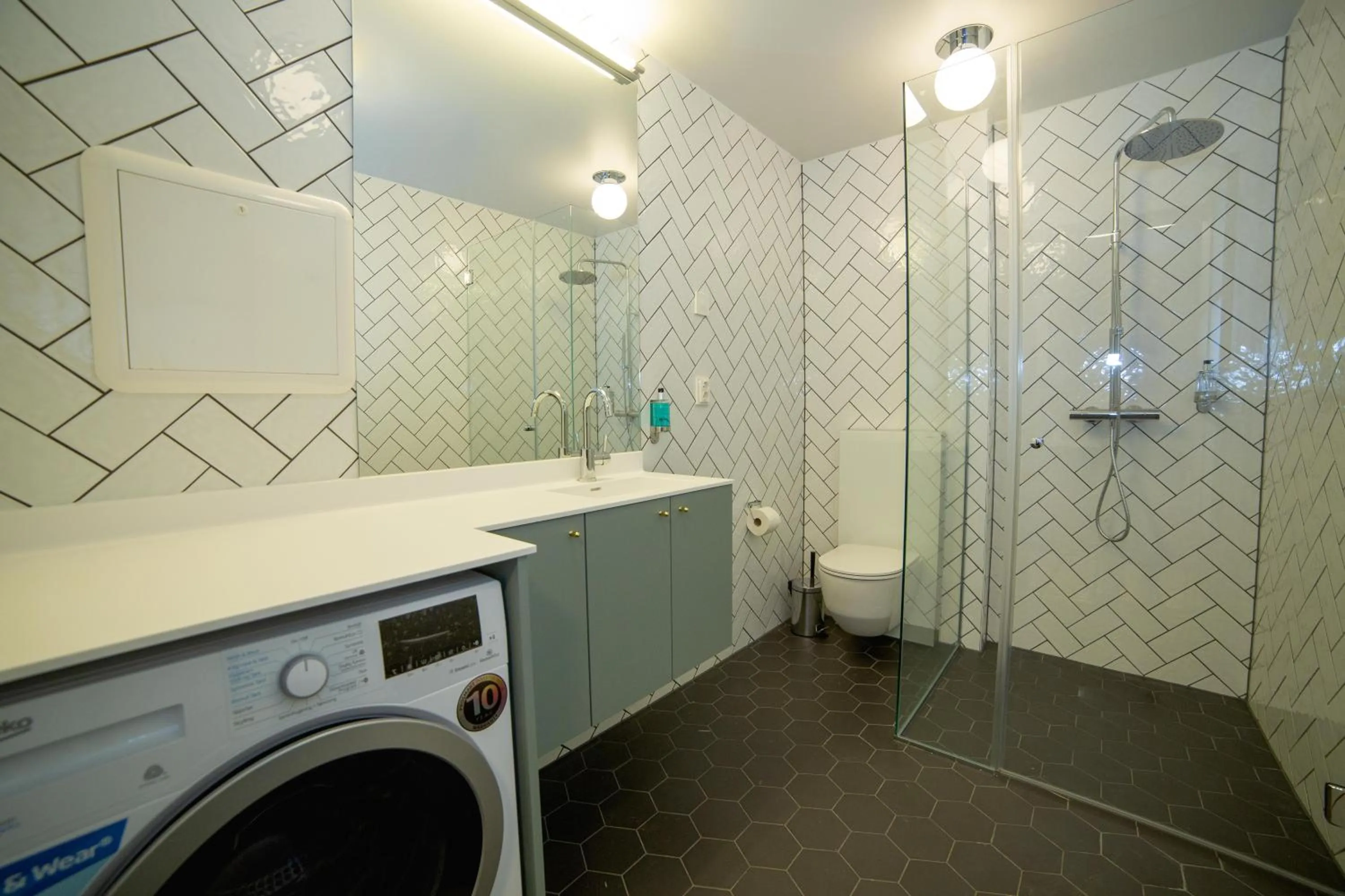 Bathroom in Home Again Apartments Kirkegata