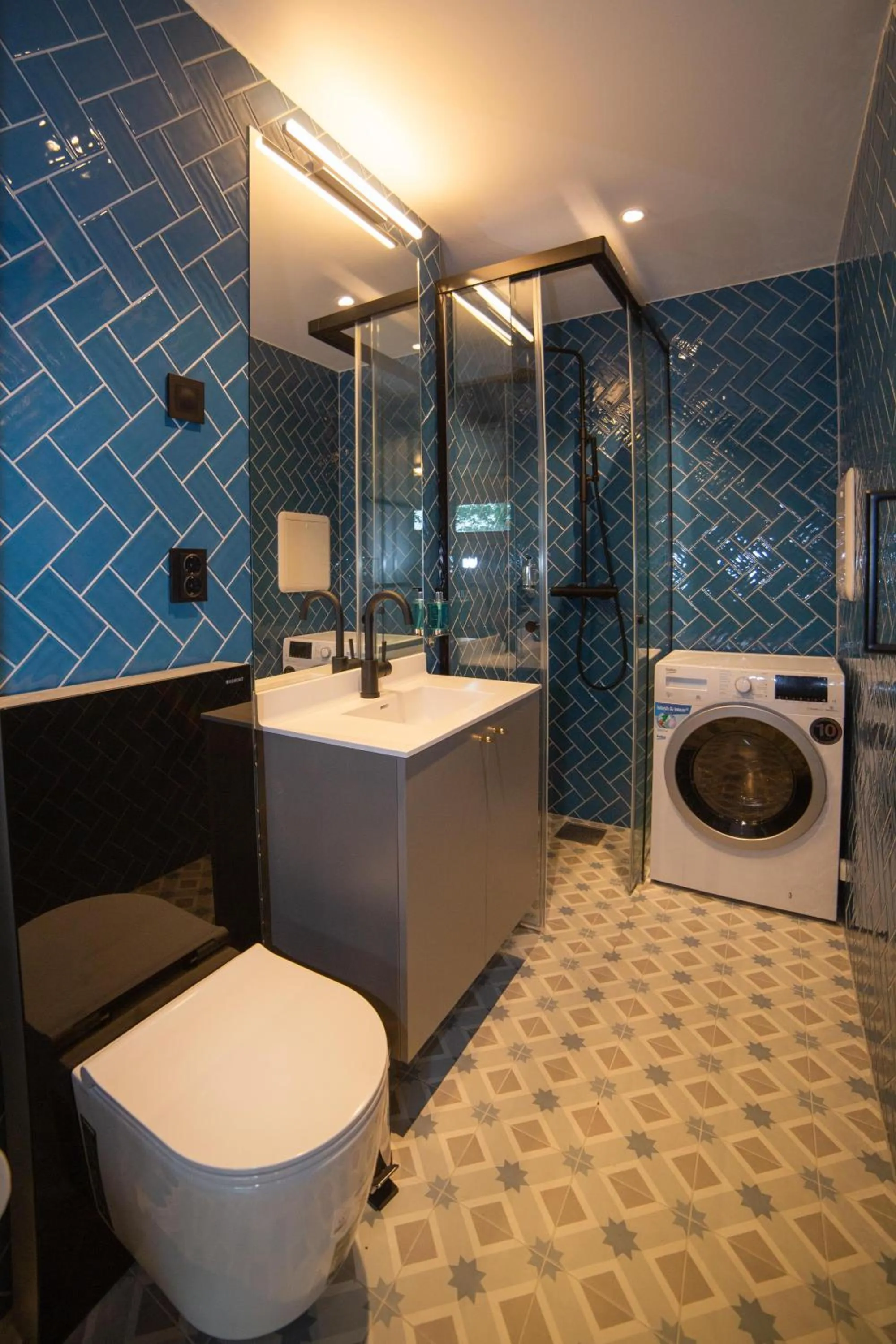 Bathroom in Home Again Apartments Kirkegata